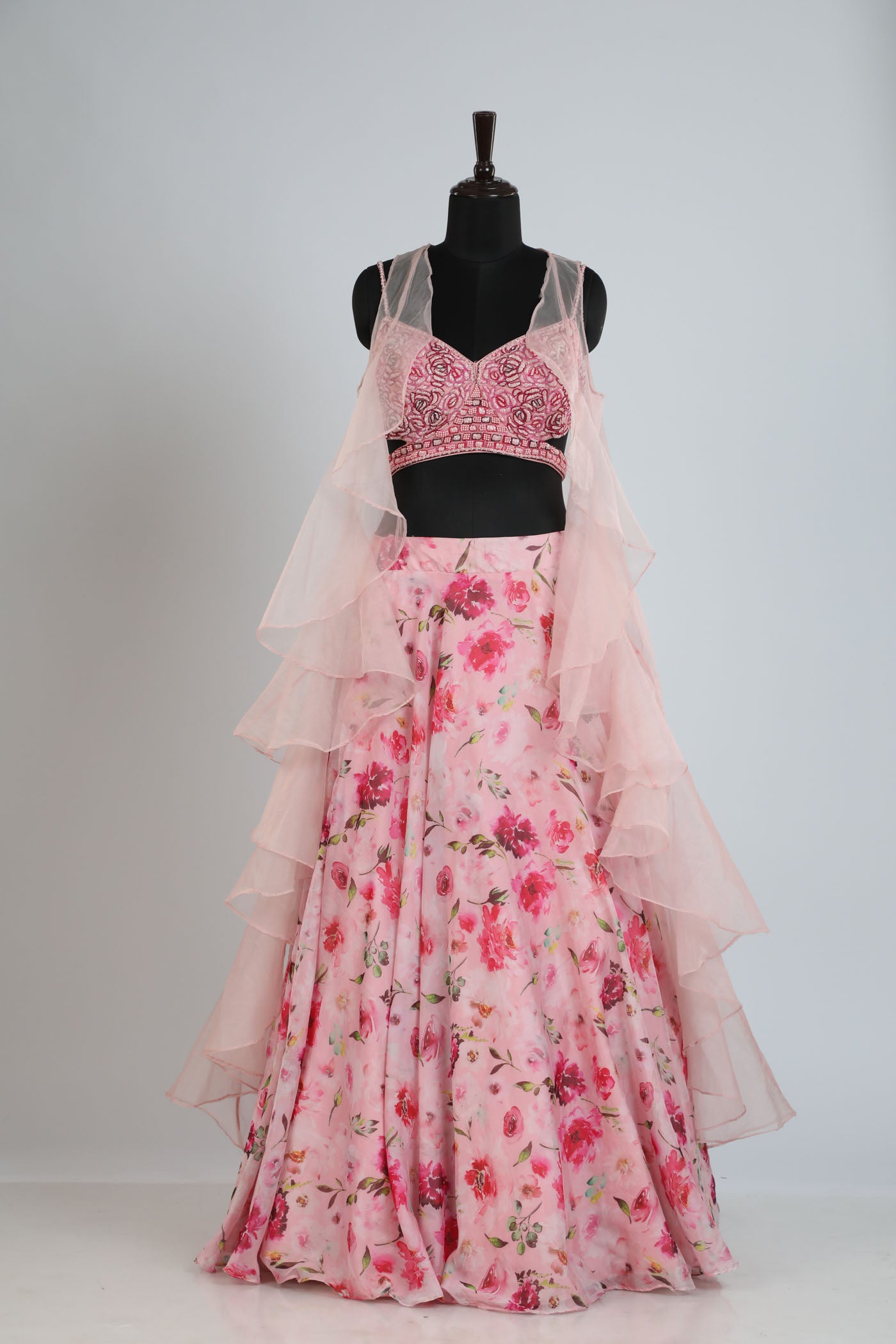 Printed lehanga with a hand embroidered blouse.