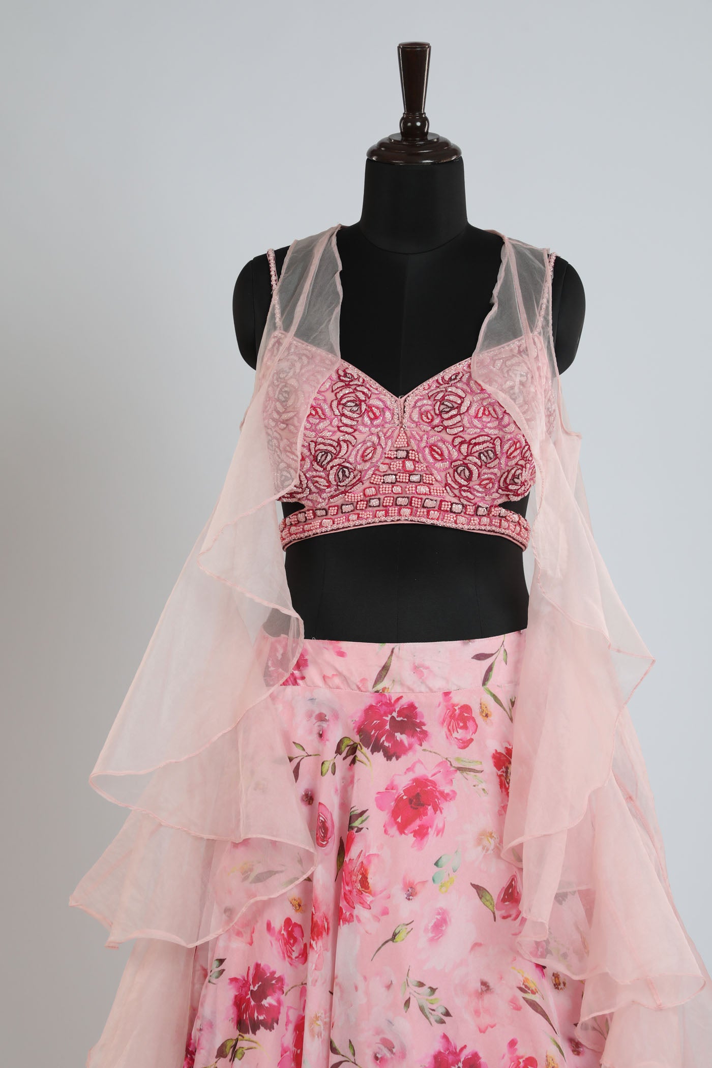 Printed lehanga with a hand embroidered blouse.