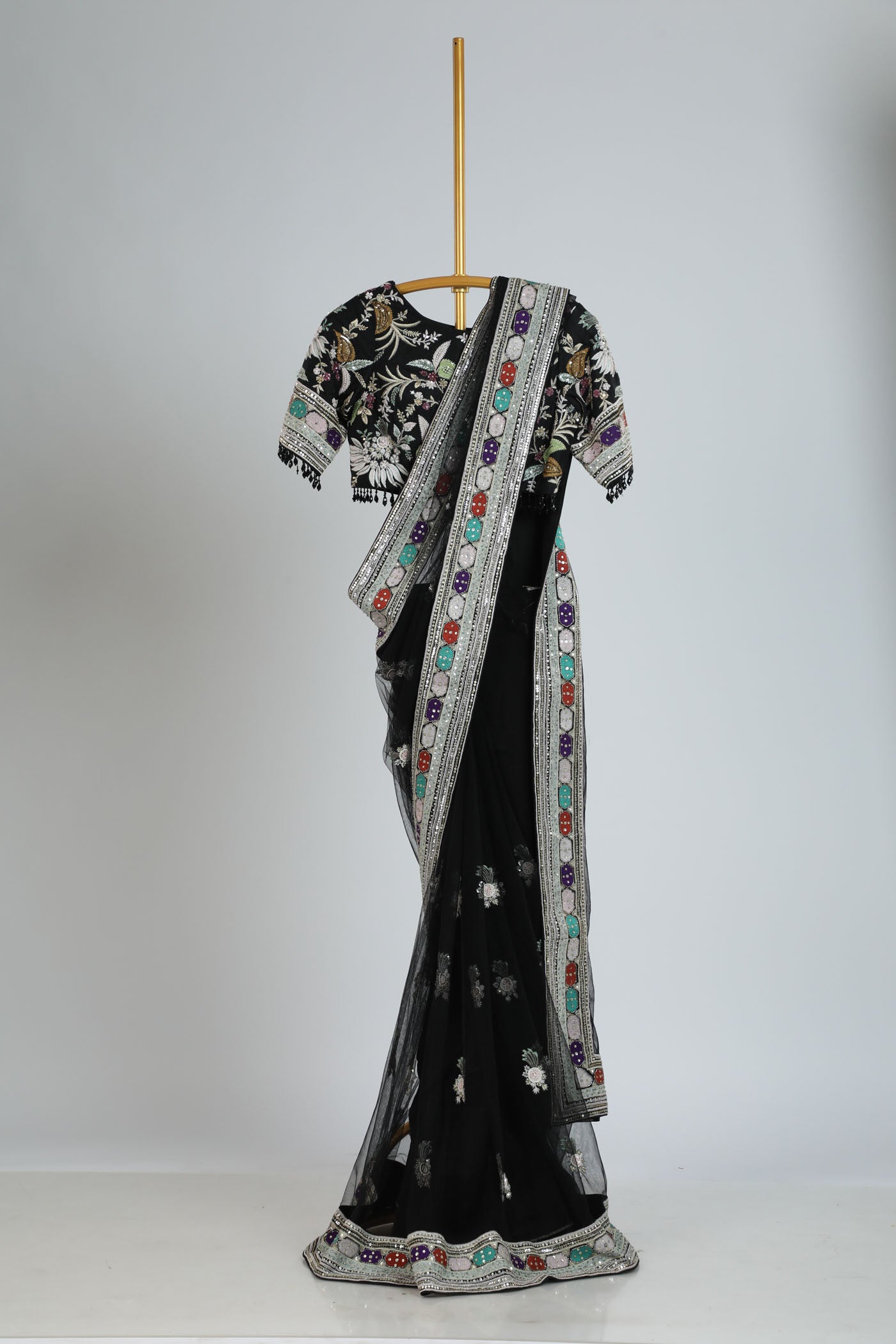 Embroidered saree with readymade blouse.