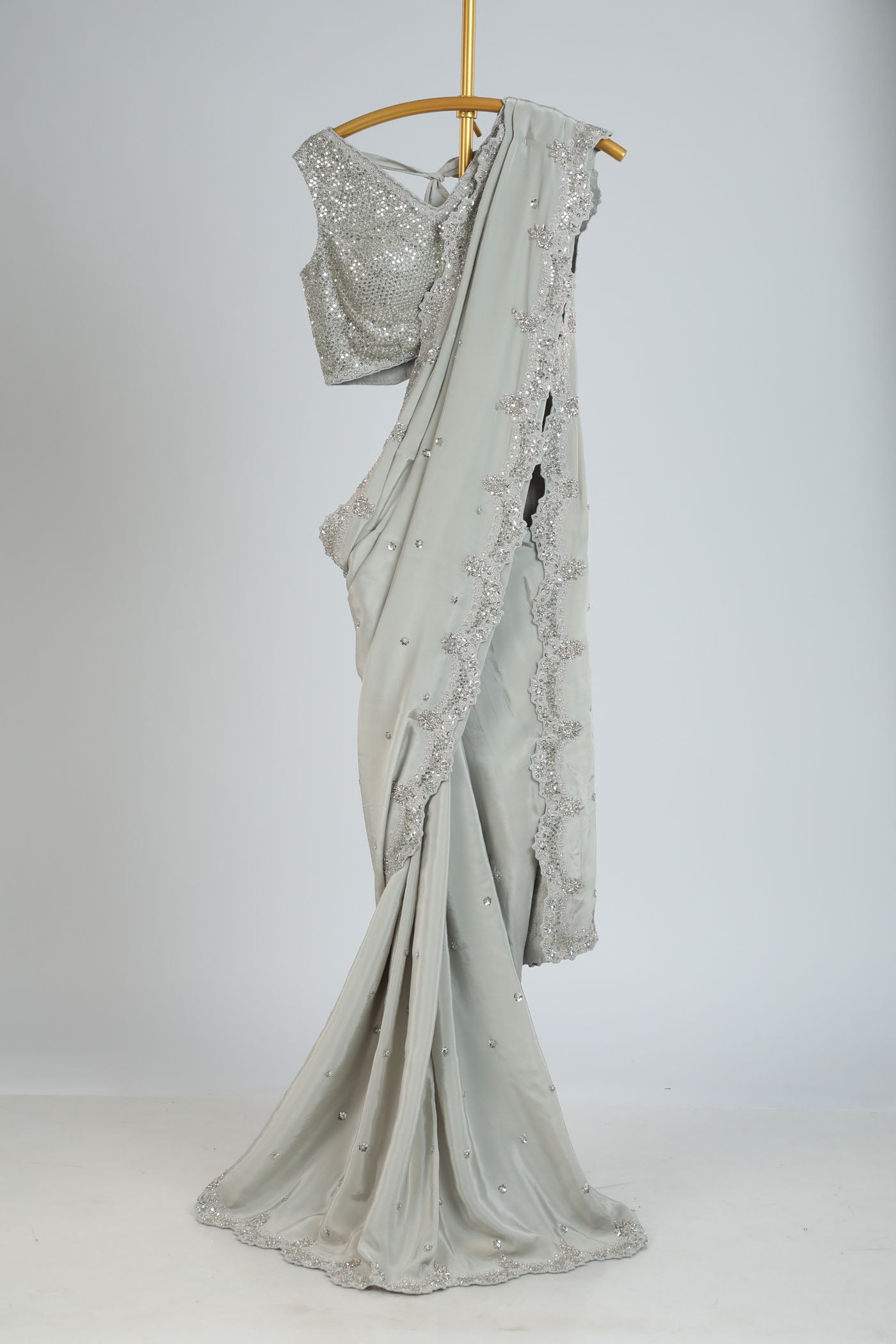 Embroidered saree with a readymade blouse.