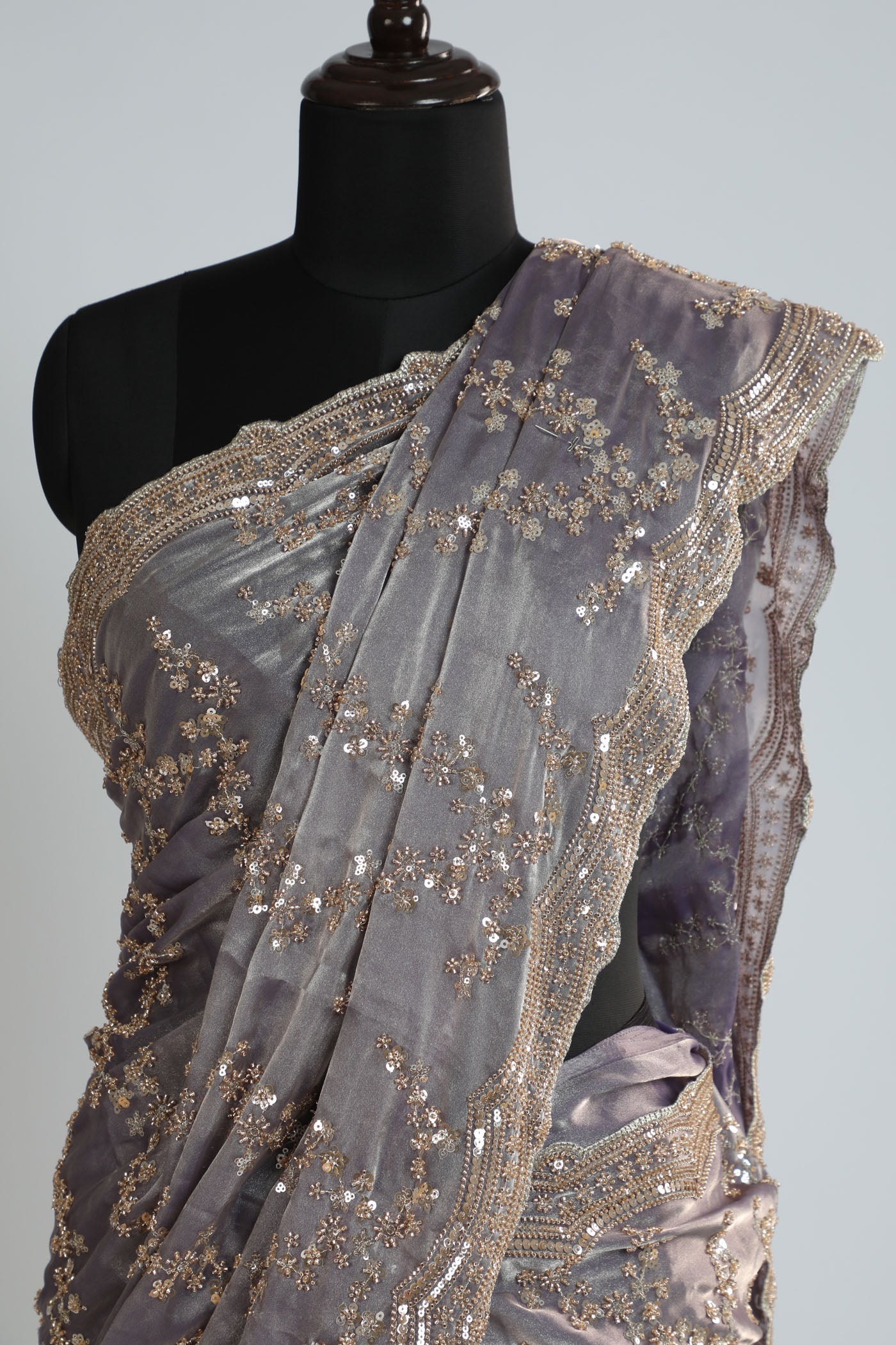 Fully embroidered saree on tissue fabric.