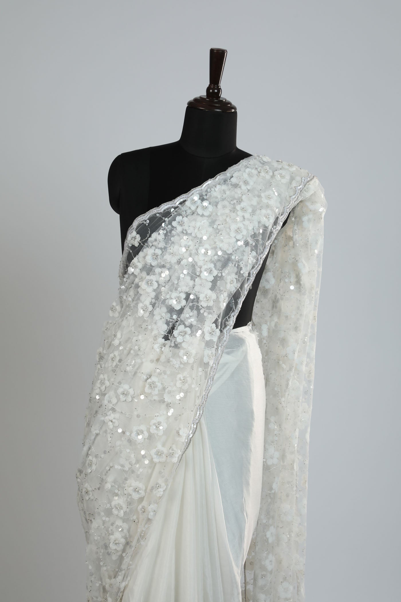 Pearl white hand Crafted Embroidery saree.