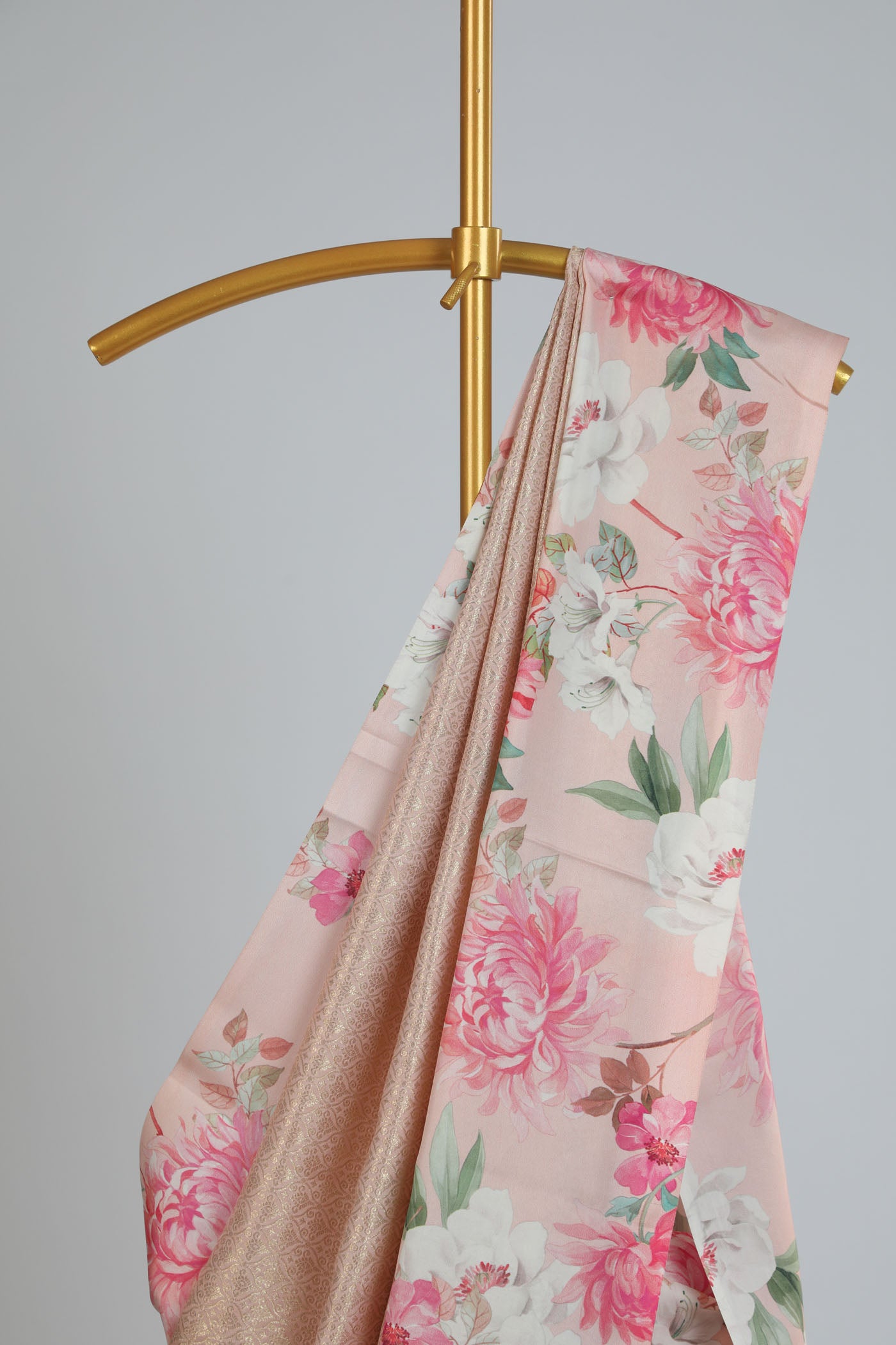 Kanchipuram brocade saree with printed border, pallu and blouse.