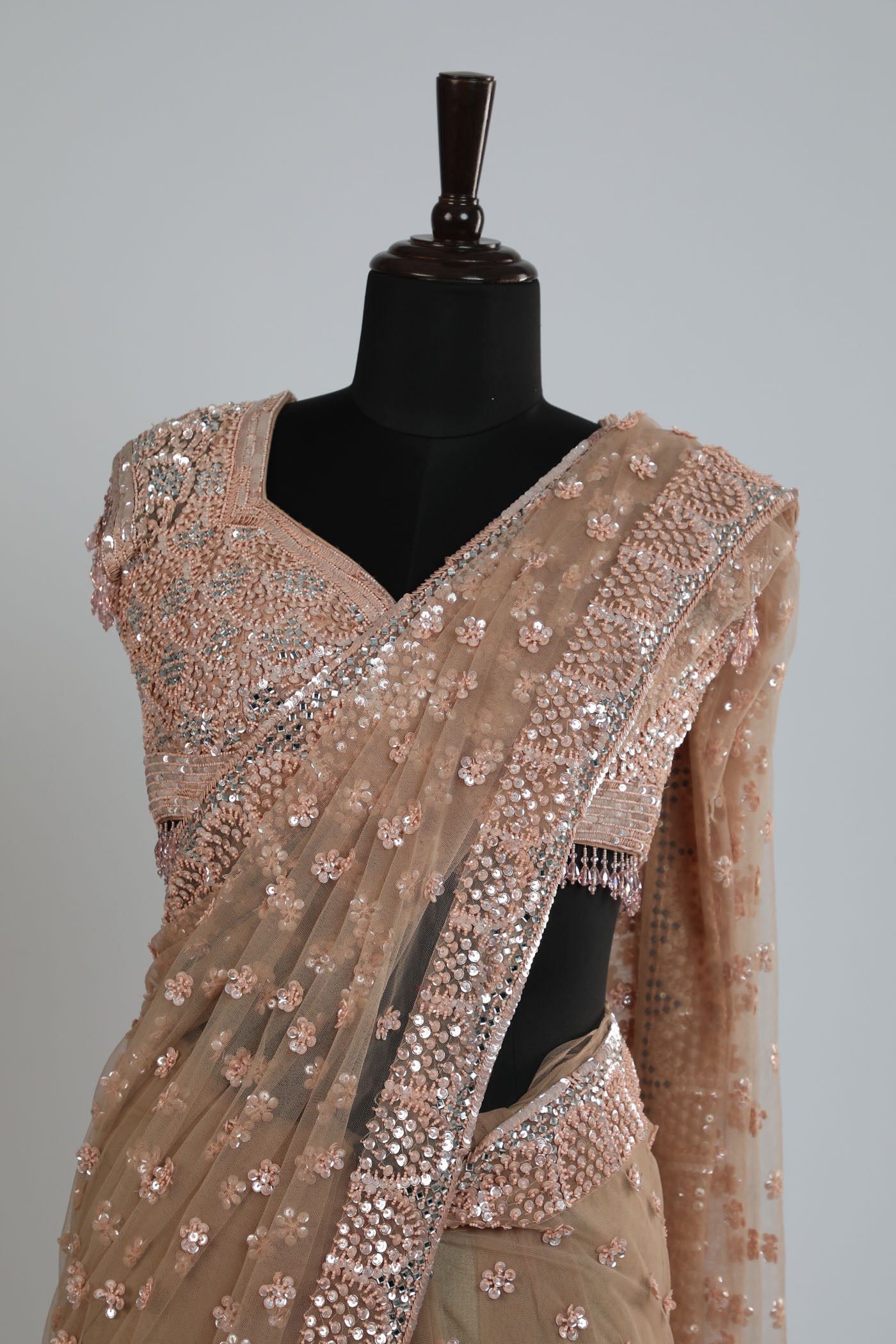 Embroidered net saree with ready made blouse