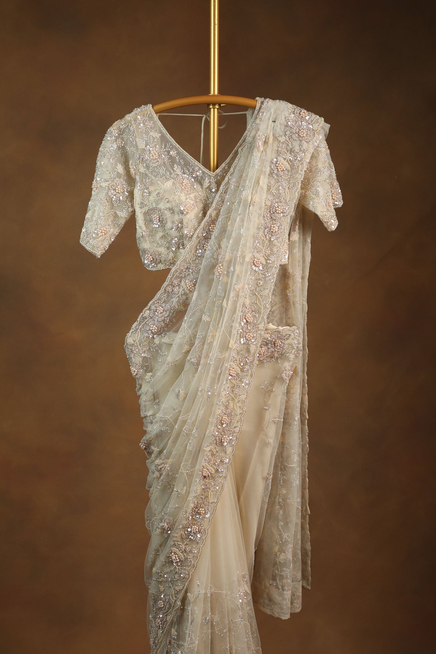 Elegant Champagne Beige Net Saree with Heavy Embroidered Blouse