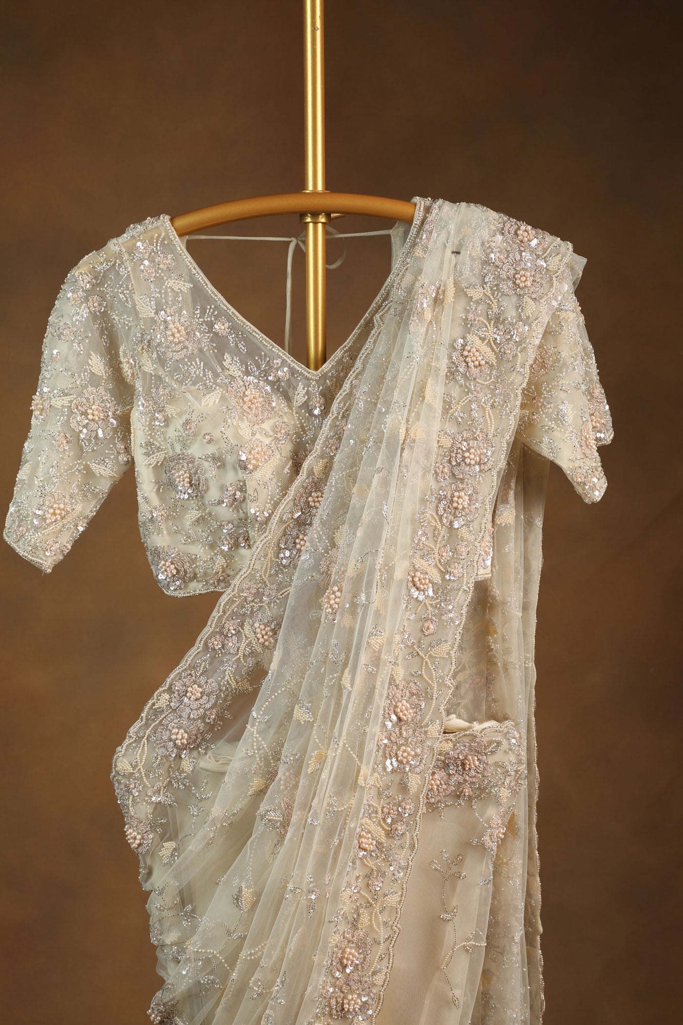 Elegant Champagne Beige Net Saree with Heavy Embroidered Blouse