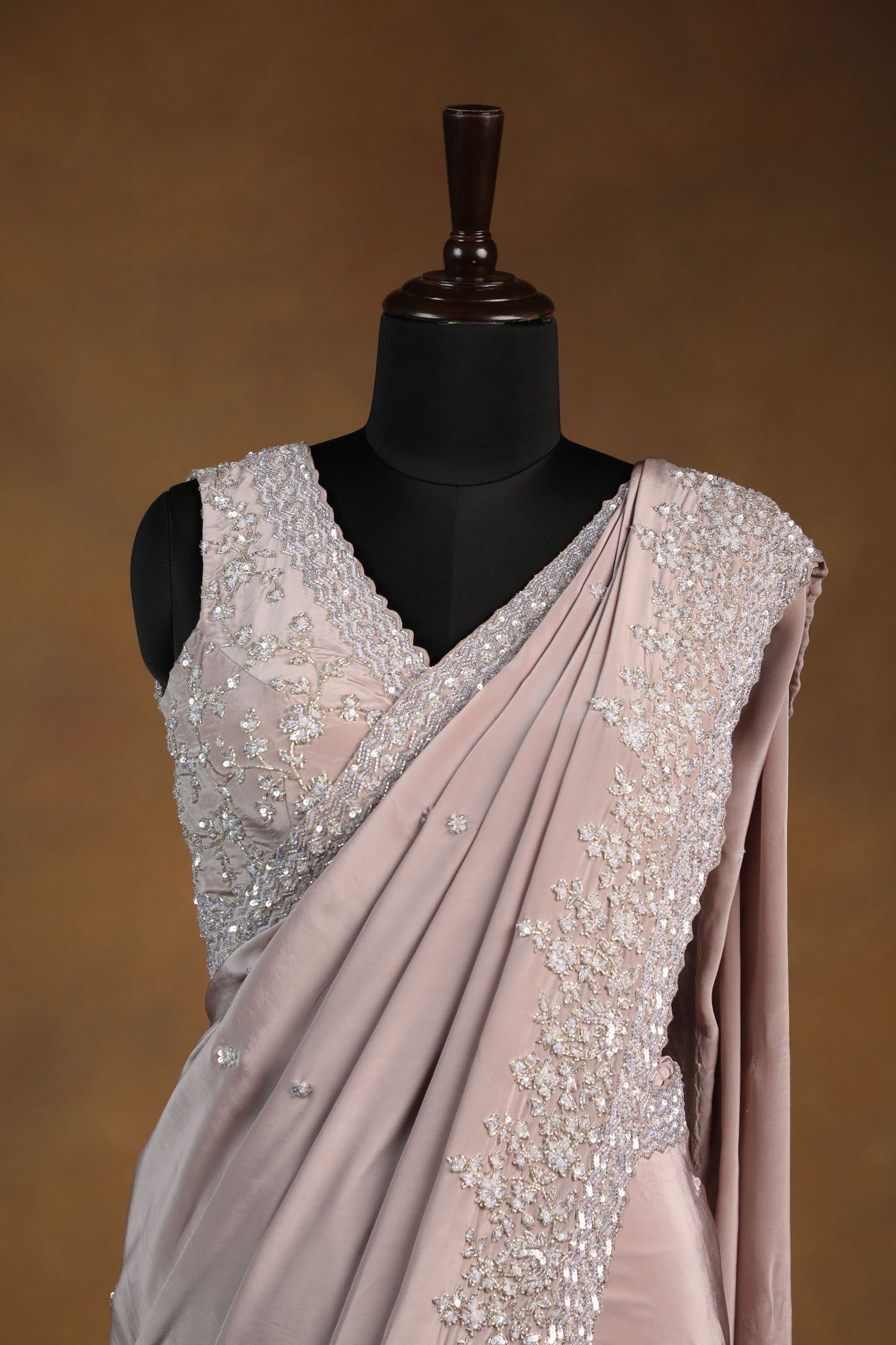 Dusty Rose crepe Saree with Sleeveless Embroidered Blouse