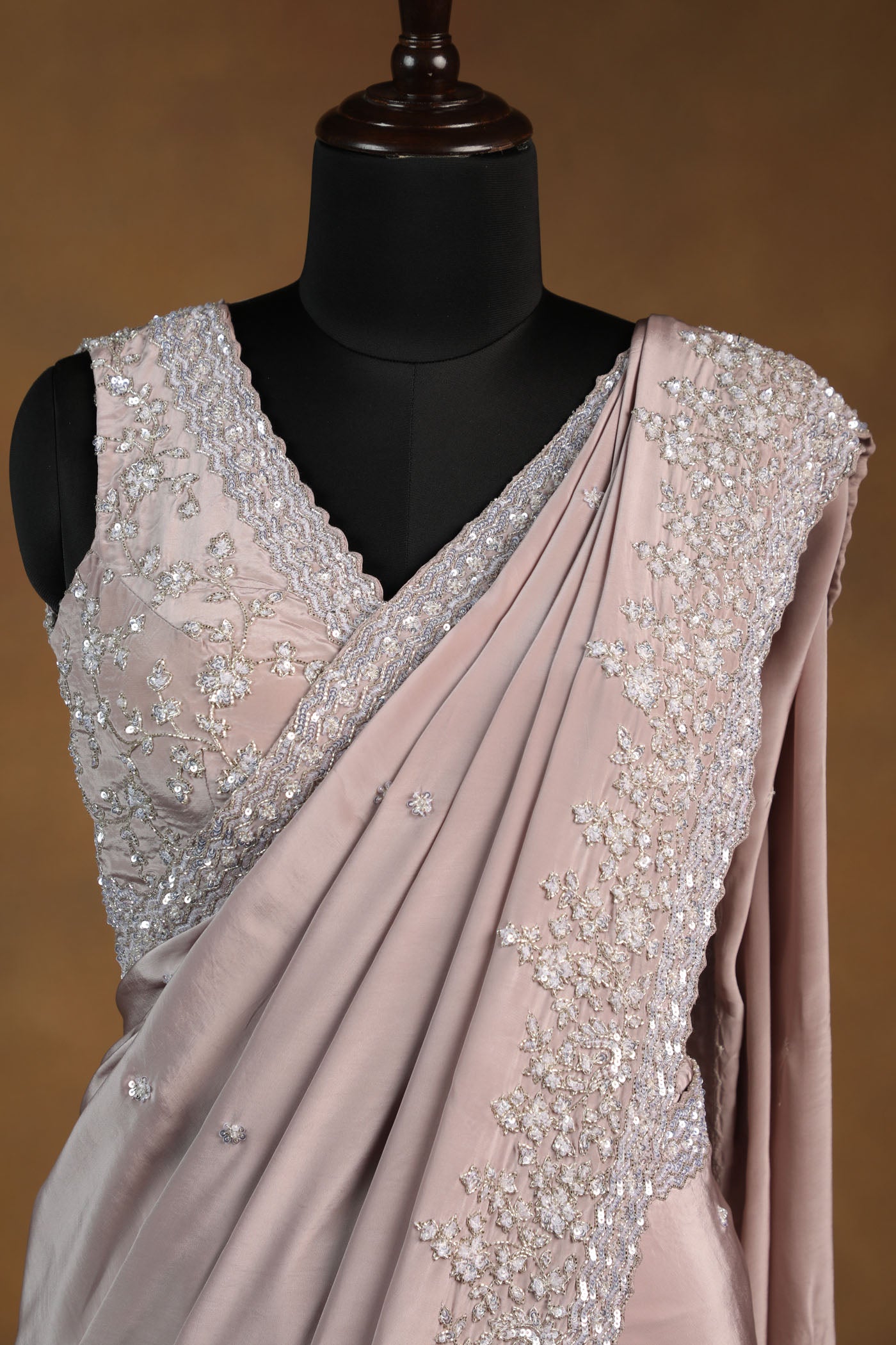 Dusty Rose crepe Saree with Sleeveless Embroidered Blouse