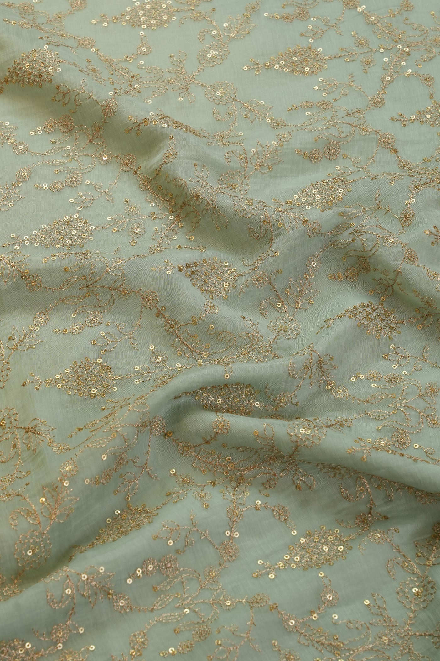 Elegant Seafoam Green Fabric with Gold Embroidery.