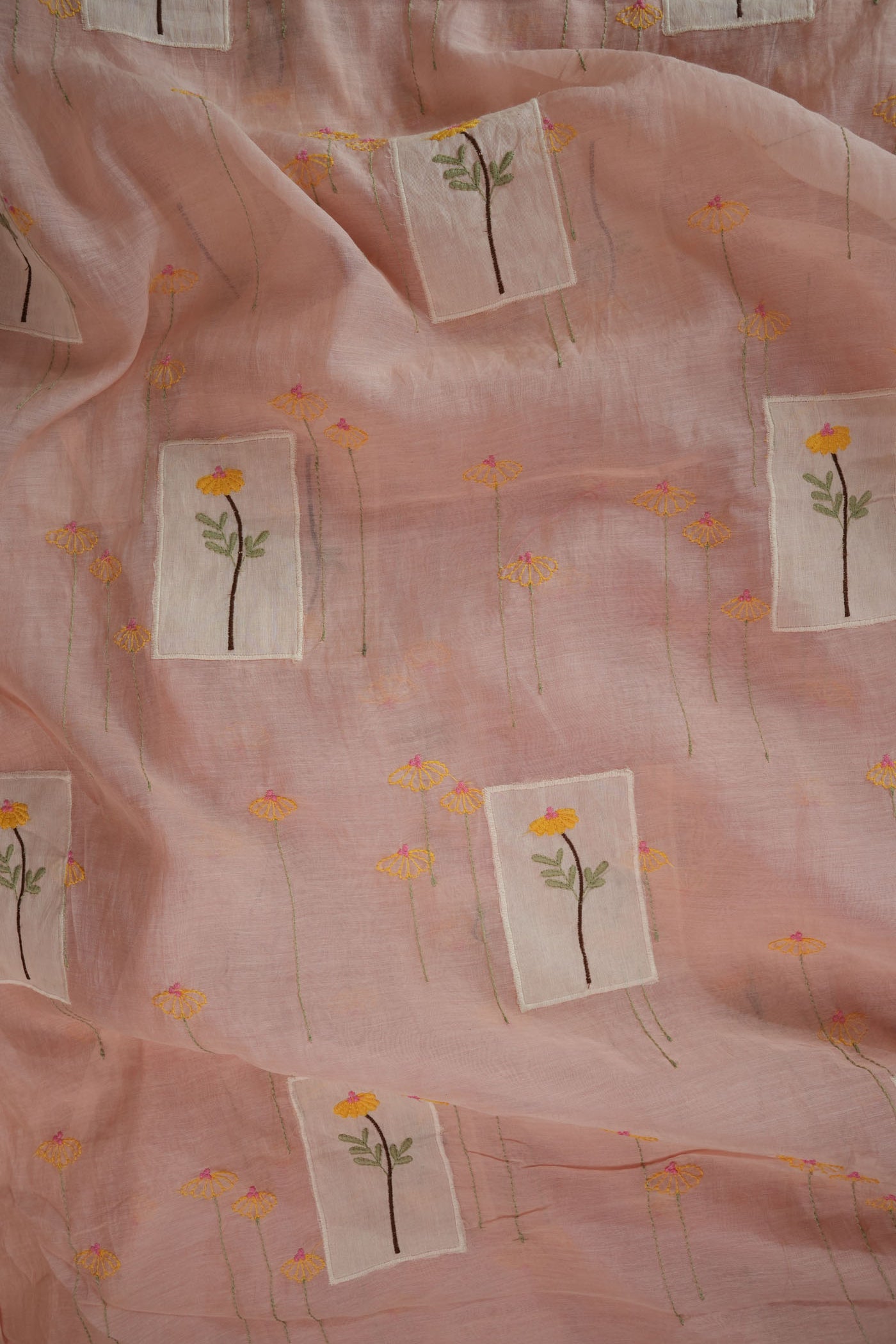 Soft Pastel Pink Fabric with Hand-Embroidered Floral Motifs