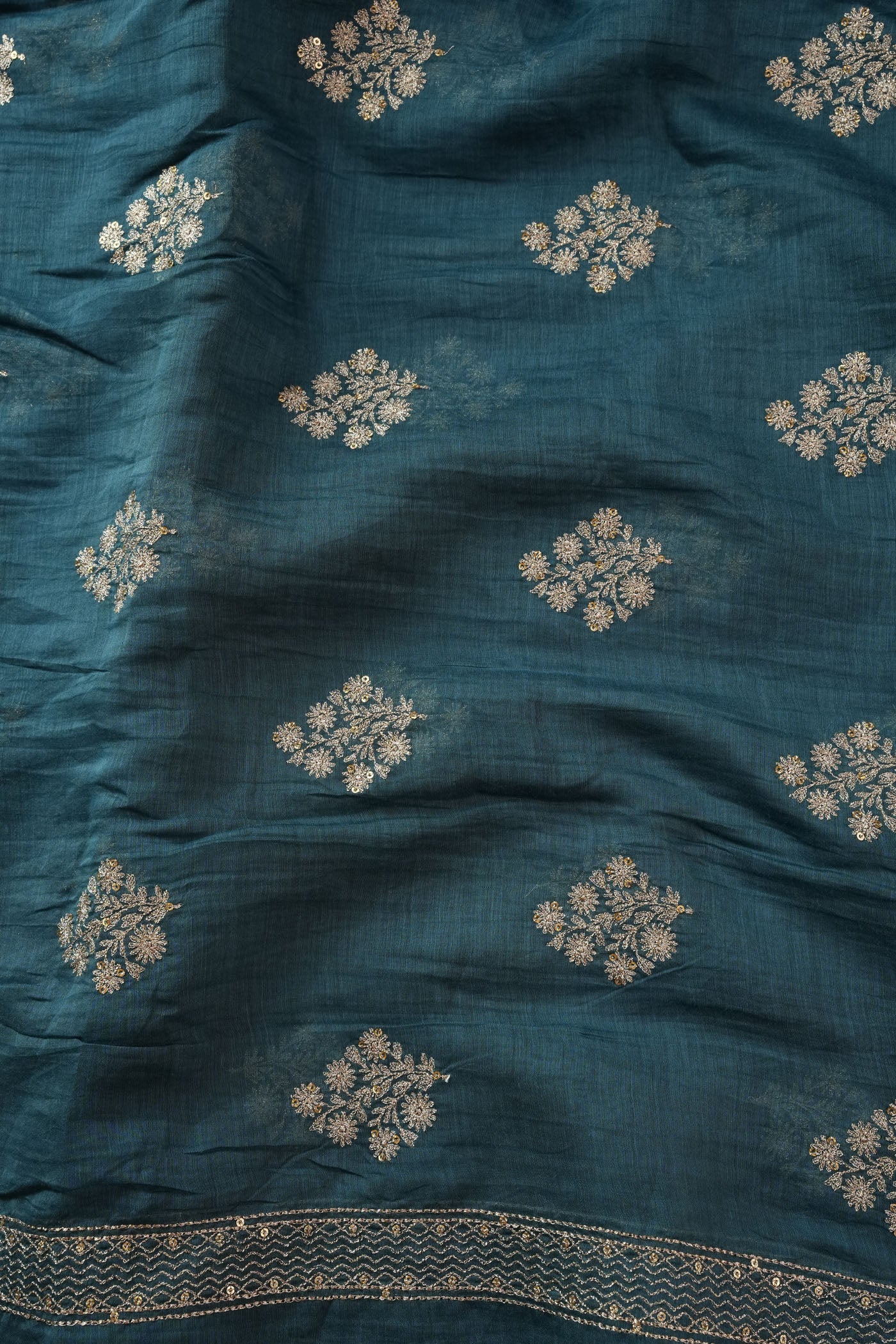 Teal Blue Fabric with Golden Zari Buta and Border Detailing