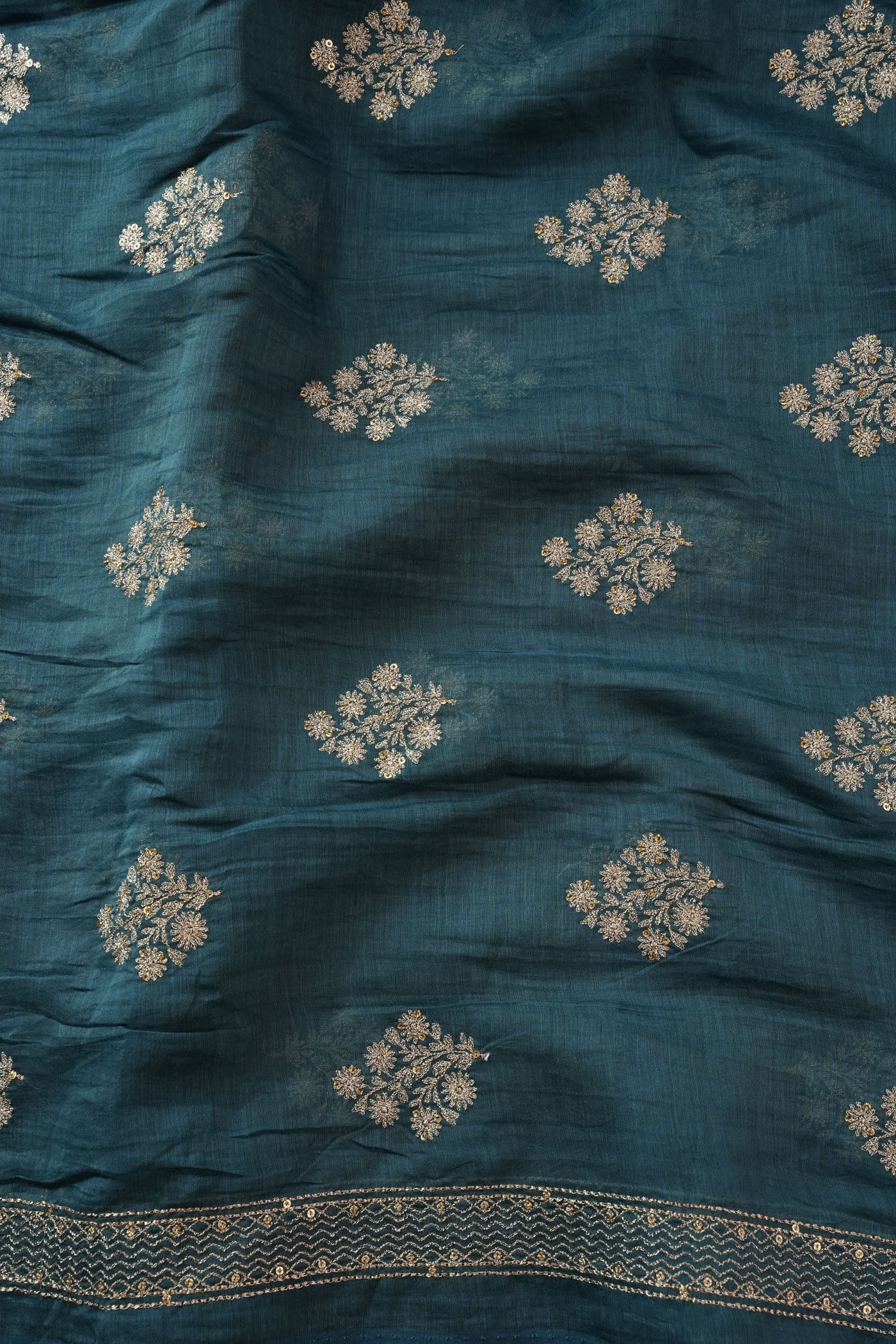 Teal Blue Fabric with Golden Zari Buta and Border Detailing
