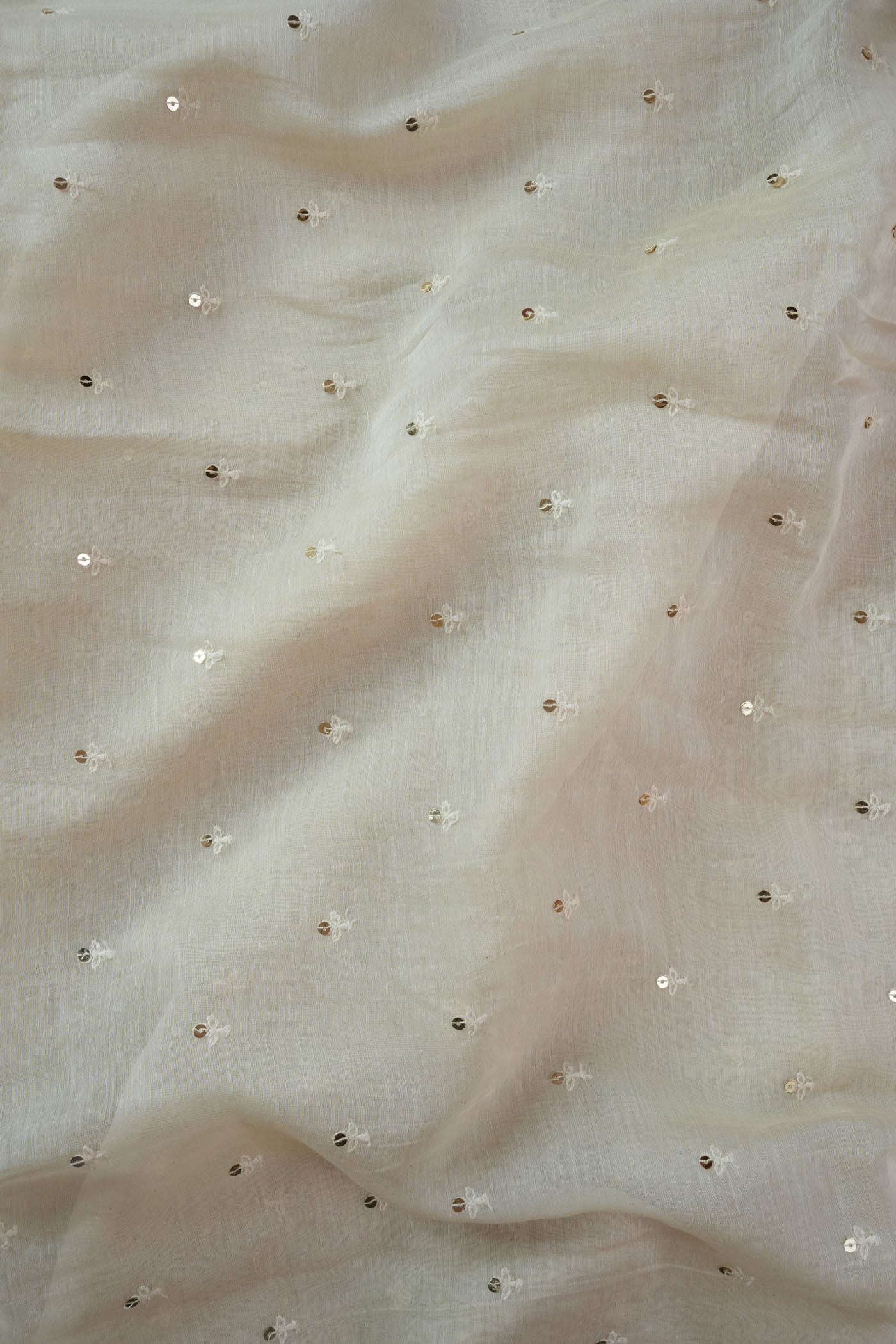 Ivory Fabric with Subtle Sequin Embellishments