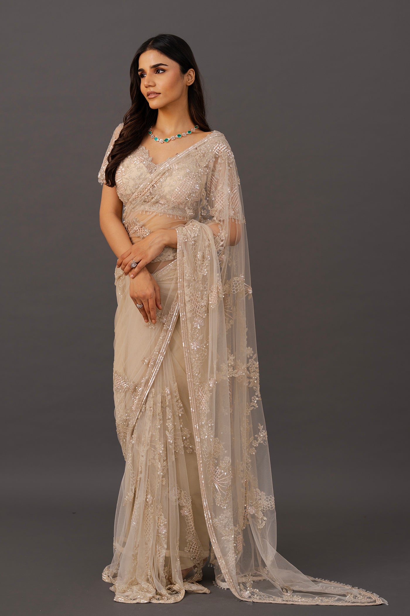 Ivory net saree with ready made blouse