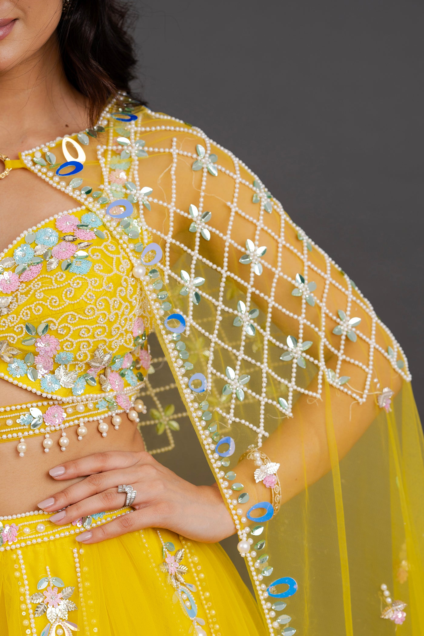 Vibrant yellow net lehenga with floor length cape (RTS)