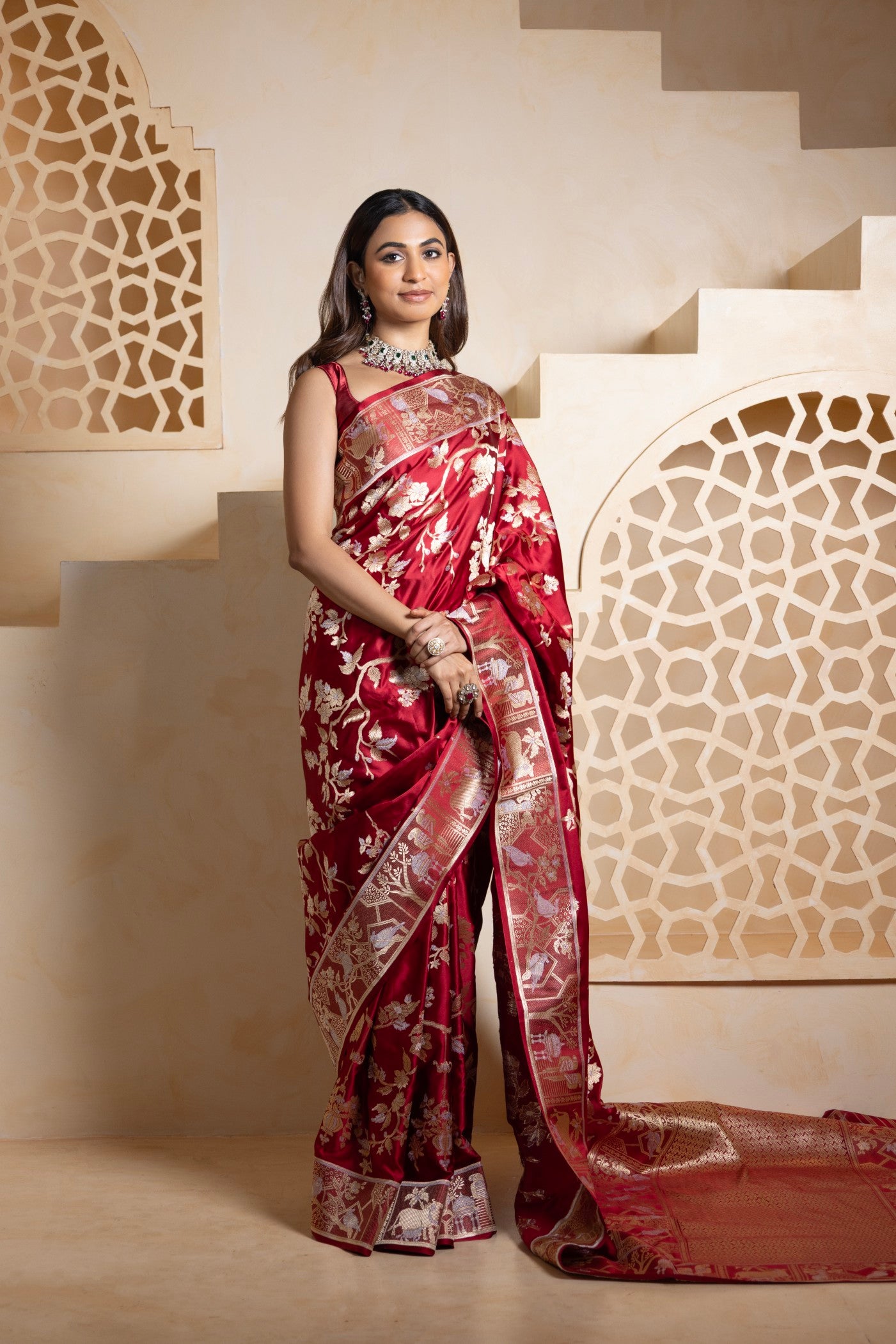 Regal Maroon Banarasi Saree with Golden Zari Floral and Folk Weave