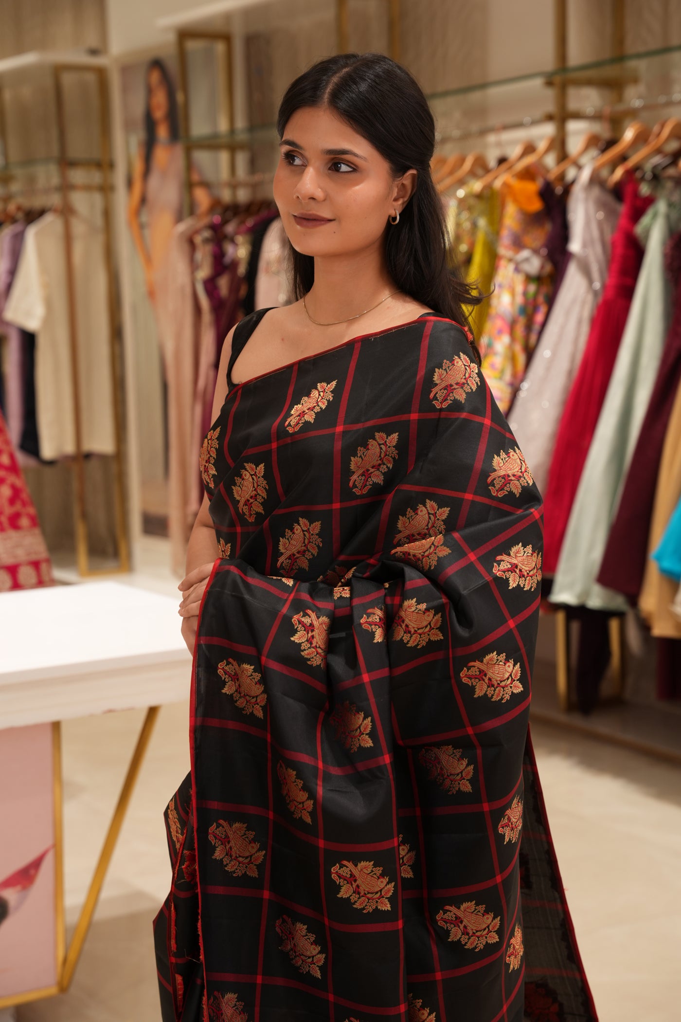 Black & Red Checked Silk Saree that comes along with a contrast pallu