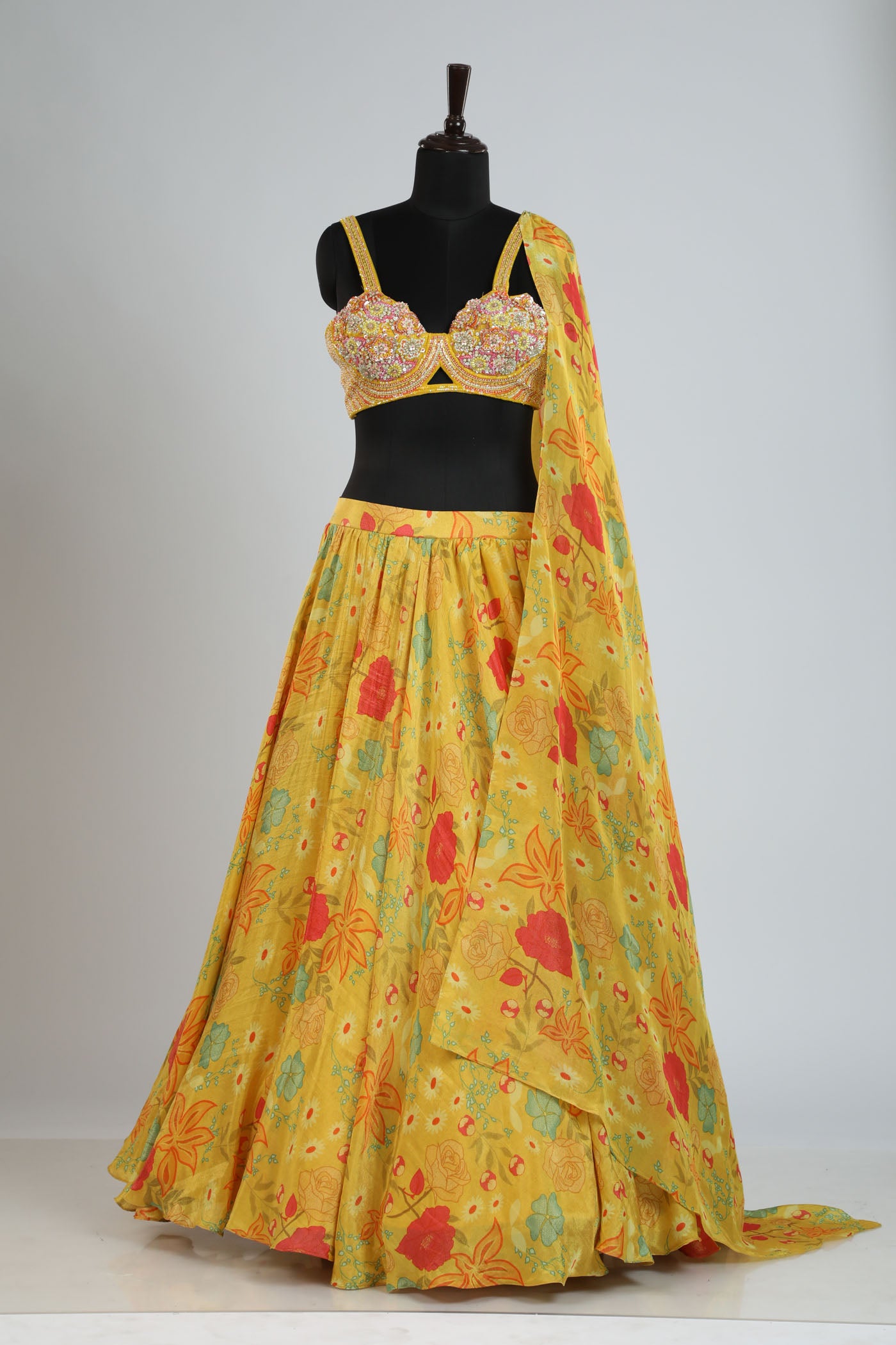 Printed lehanga with a hand crafted blouse.