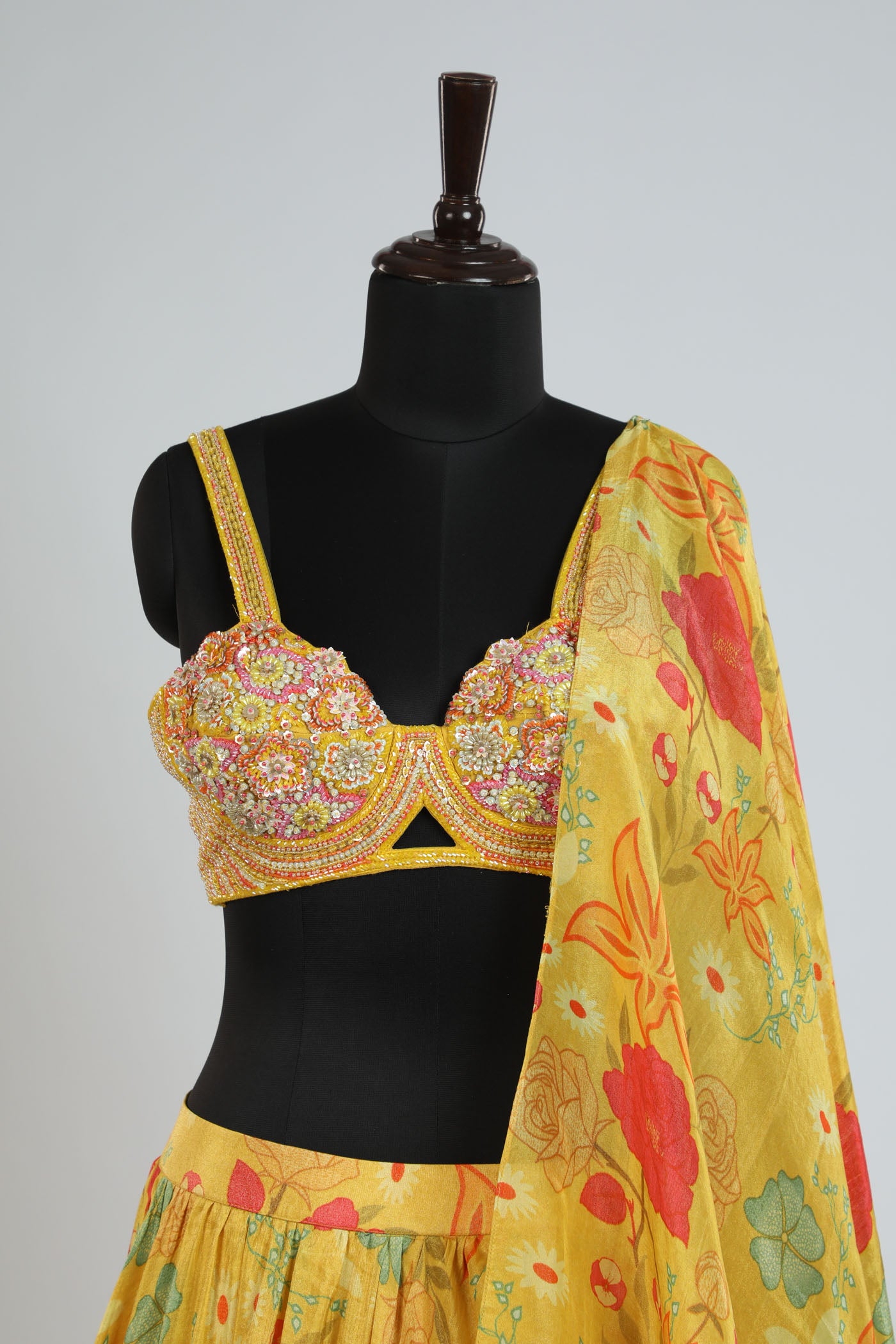 Printed lehanga with a hand crafted blouse.