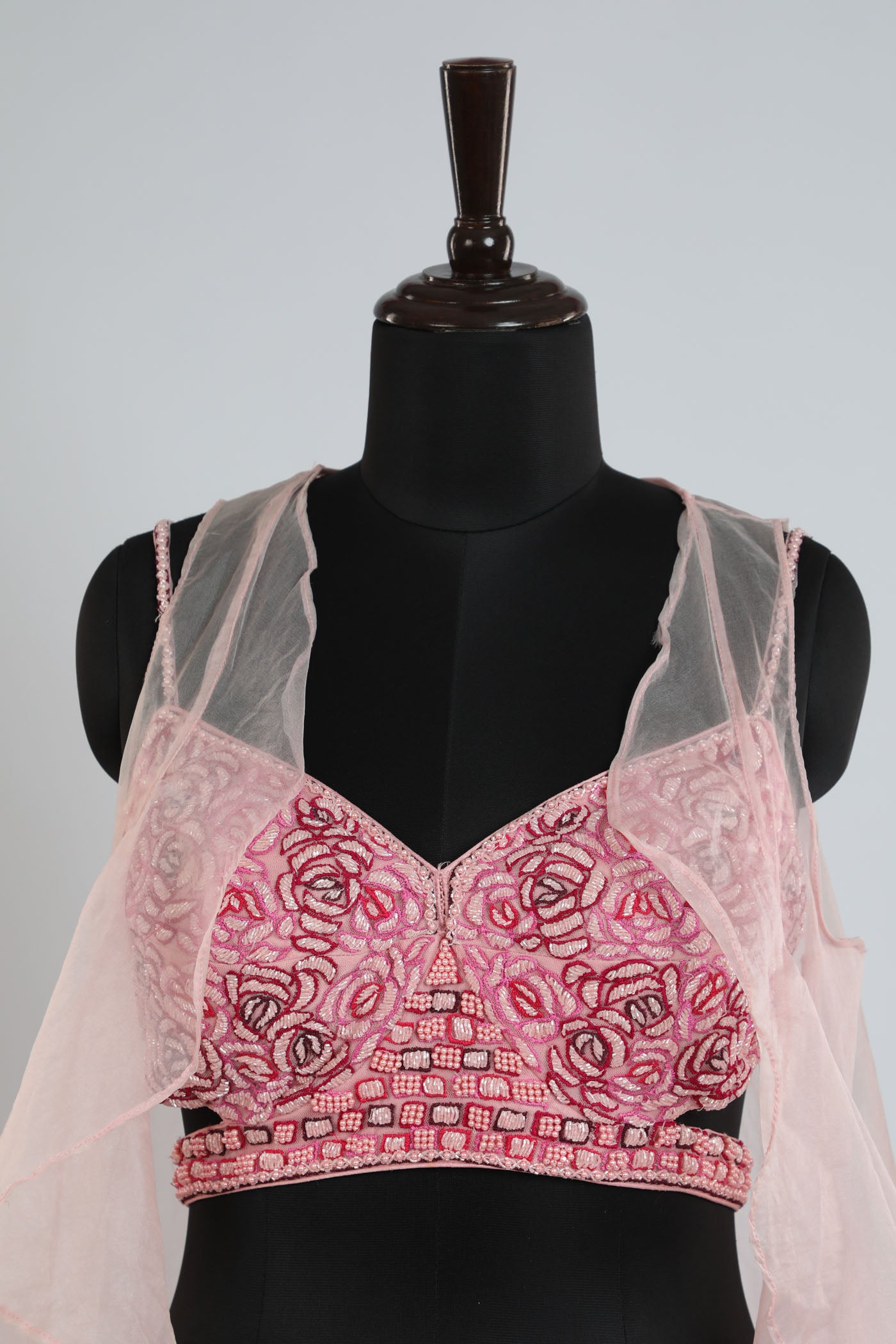 Printed lehanga with a hand embroidered blouse.