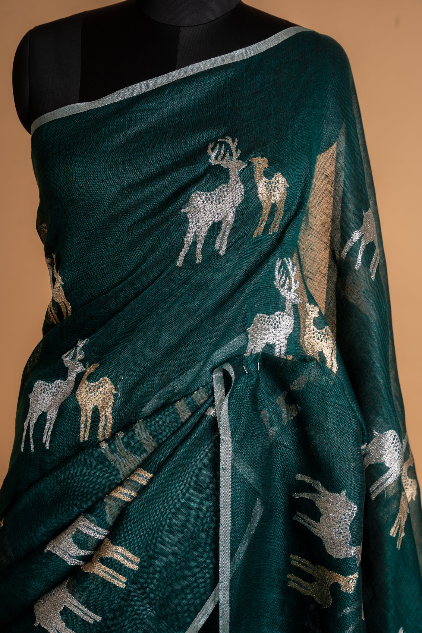 Teal Blue Handwoven Linen Saree with Tissue Pallu

 (RTS)