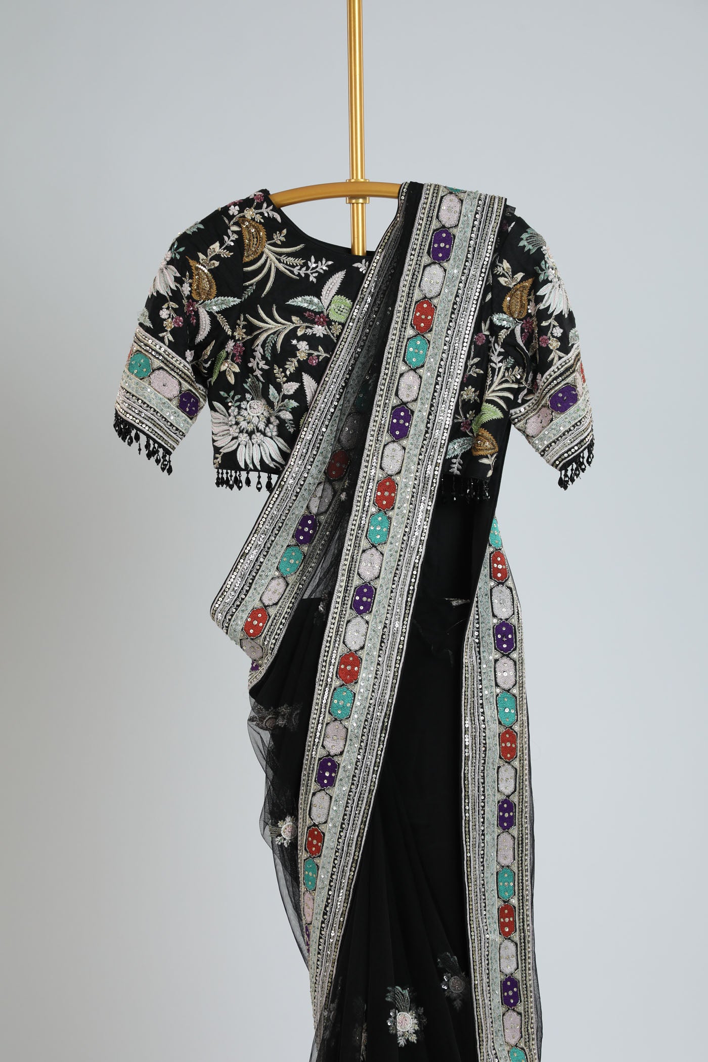 Embroidered saree with readymade blouse.