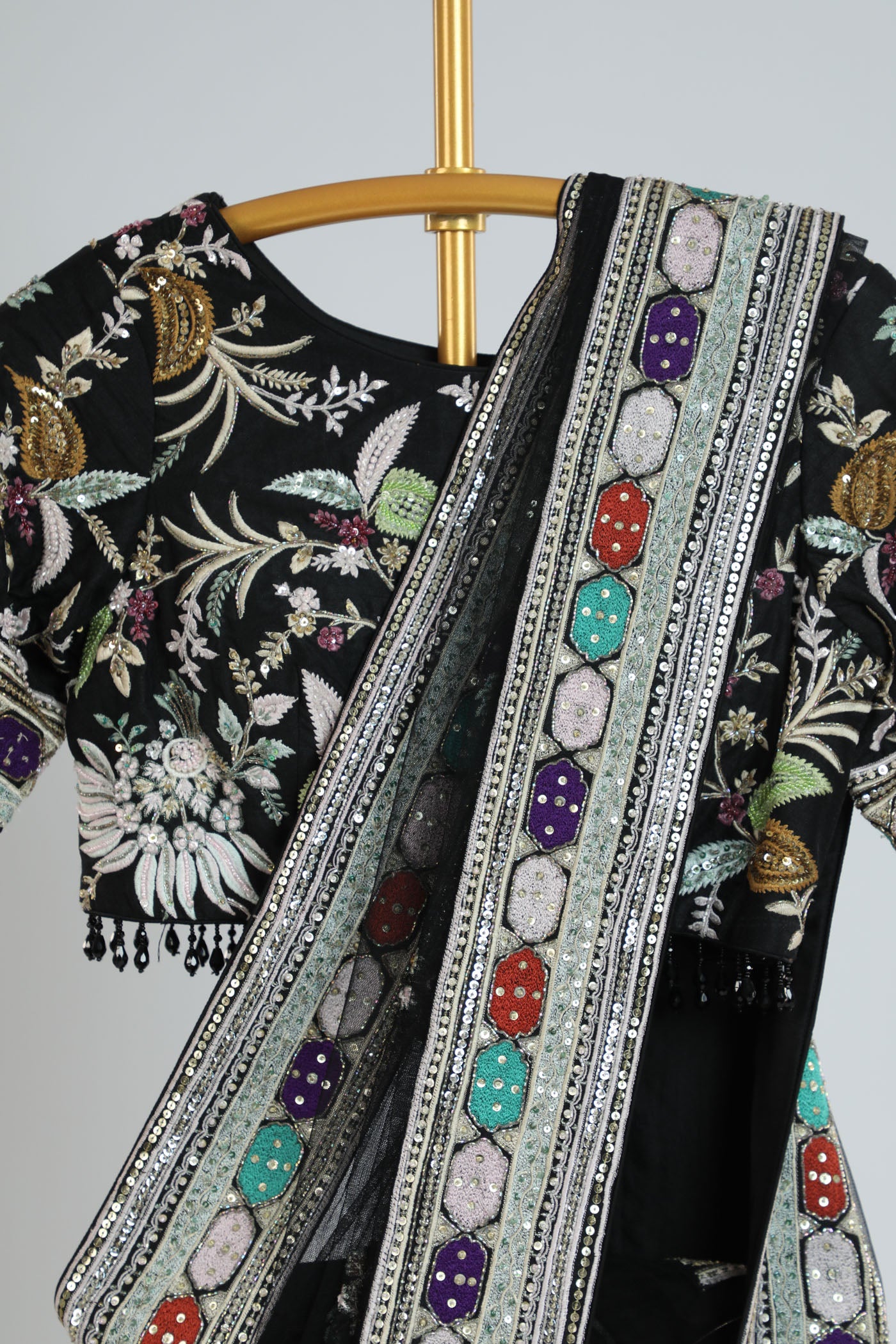 Embroidered saree with readymade blouse.