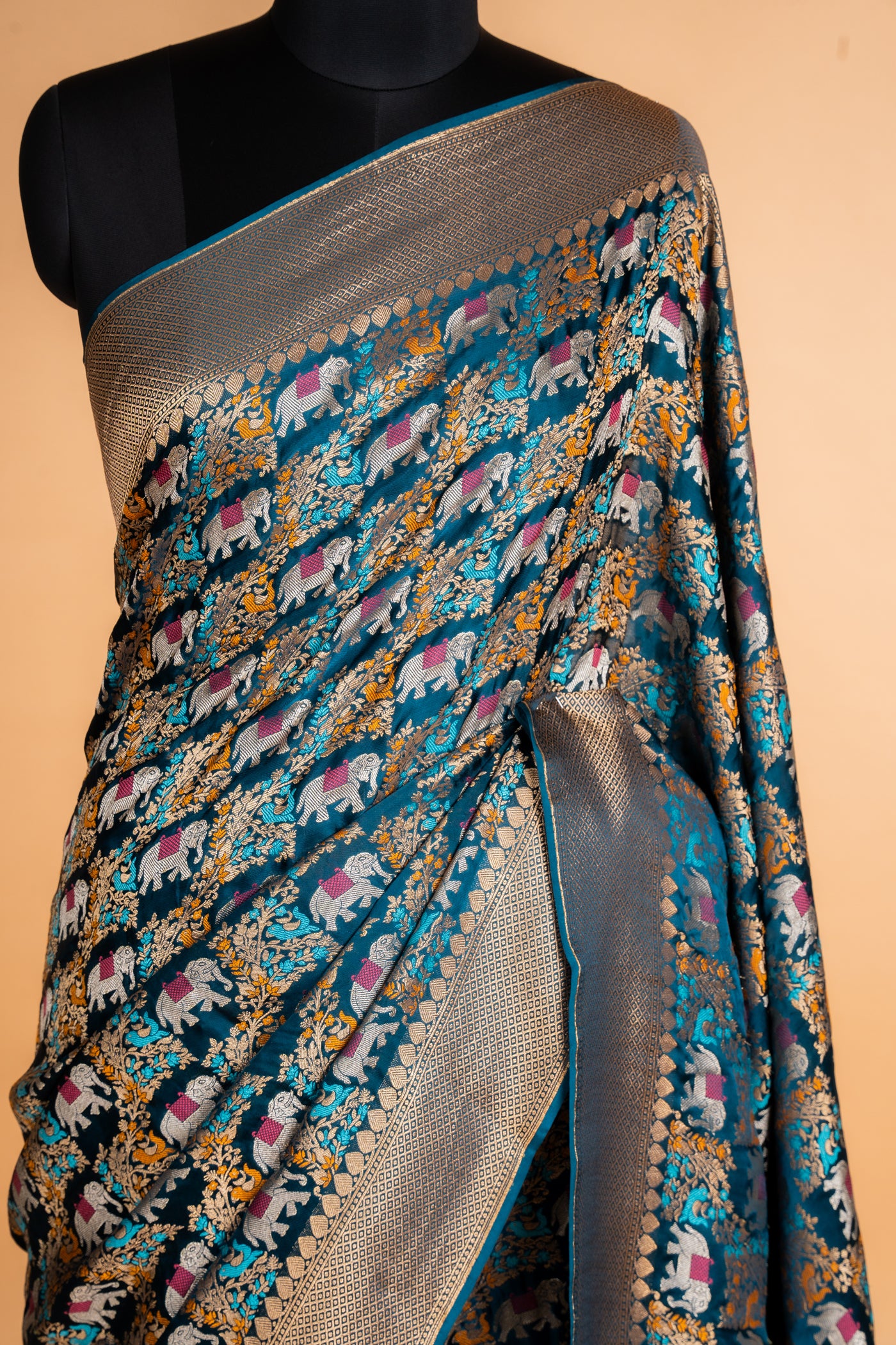 Peacock Blue Banarasi Georgette Silk Saree with Meenakari Shikargah Elephant Motifs & Antique Gold Zari Border (RTS)