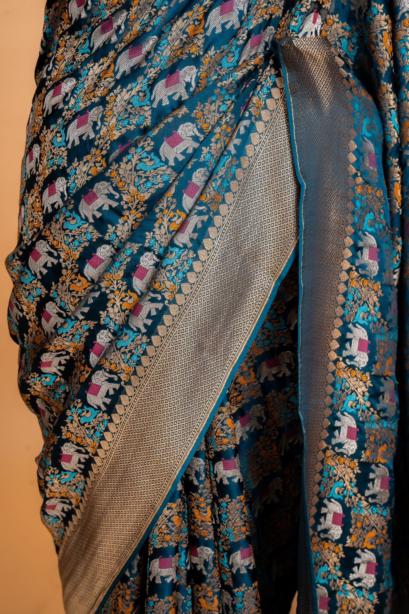Peacock Blue Banarasi Georgette Silk Saree with Meenakari Shikargah Elephant Motifs & Antique Gold Zari Border (RTS)