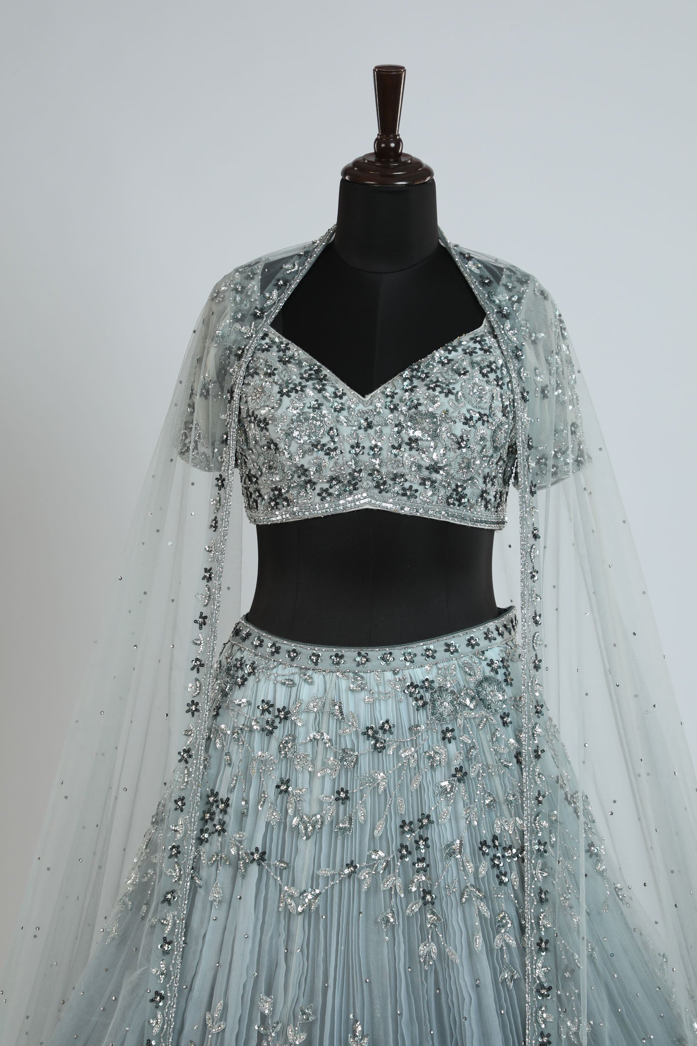 Shaded handcrafted lehenga on net. (RTS)