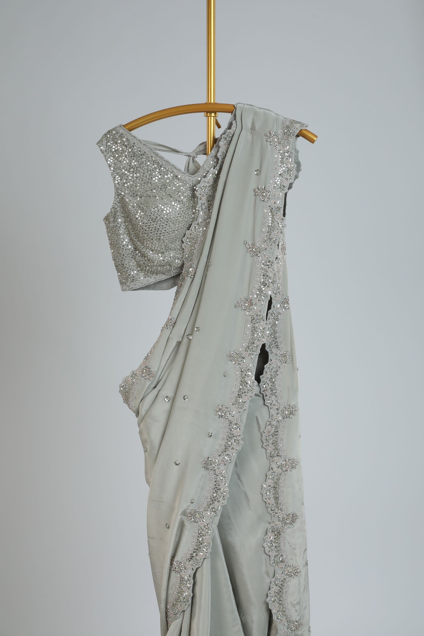 Embroidered saree with a readymade blouse.