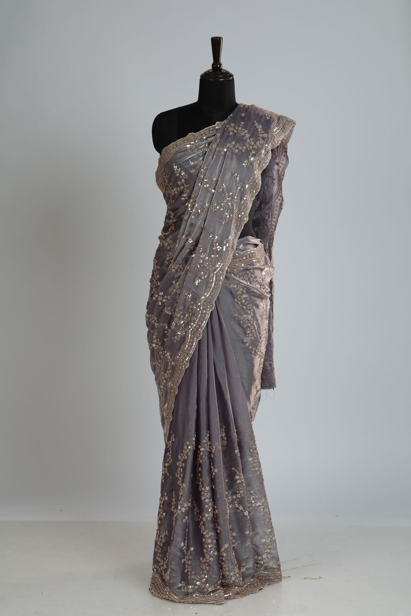 Fully embroidered saree on tissue fabric.