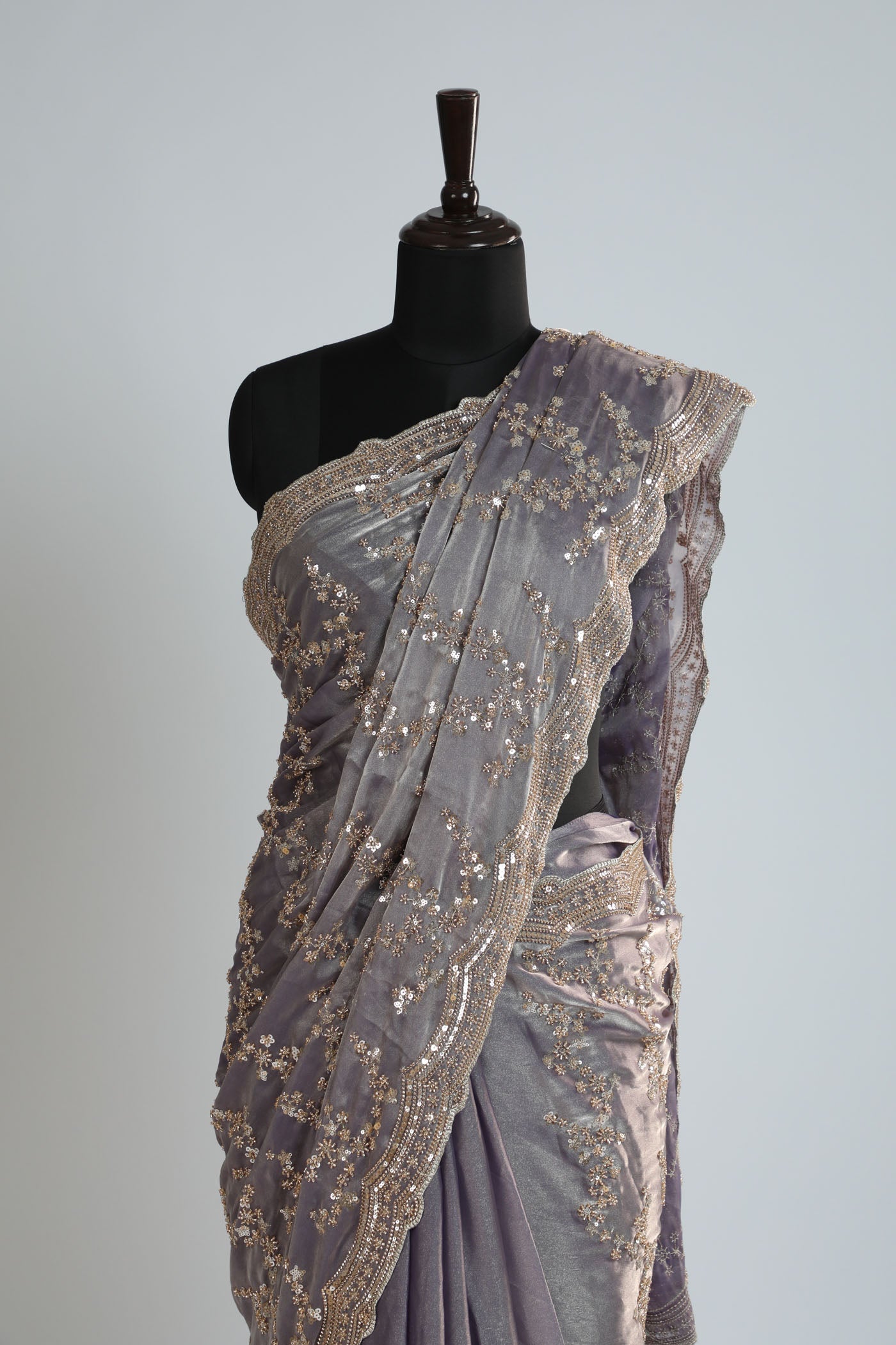 Fully embroidered saree on tissue fabric.