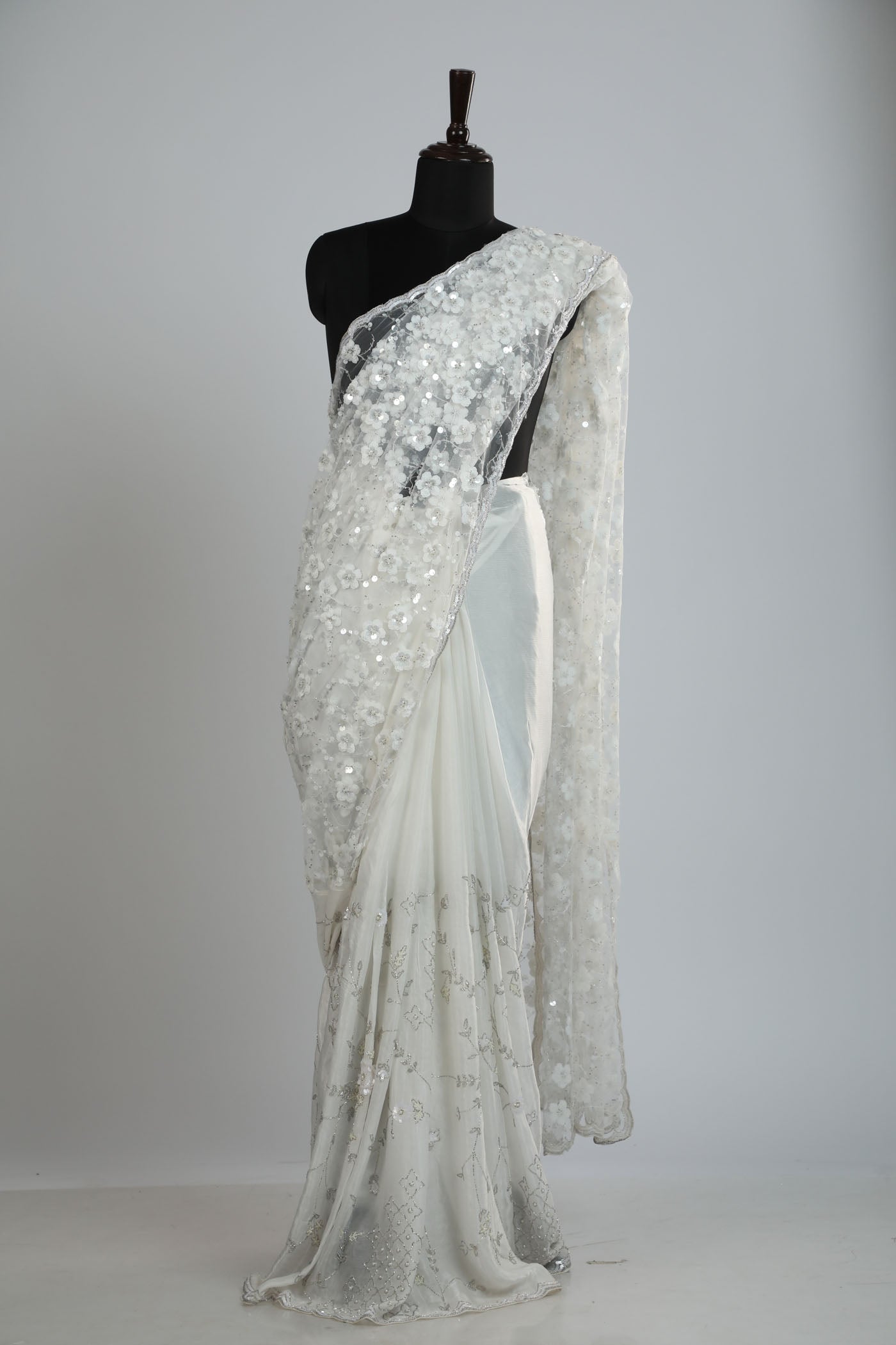 Pearl white hand Crafted Embroidery saree.