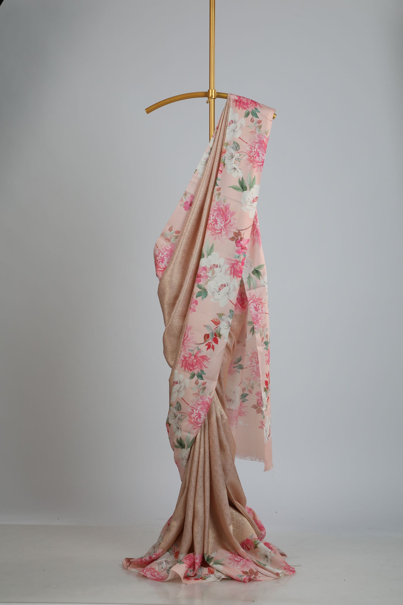 Kanchipuram brocade saree with printed border, pallu and blouse.