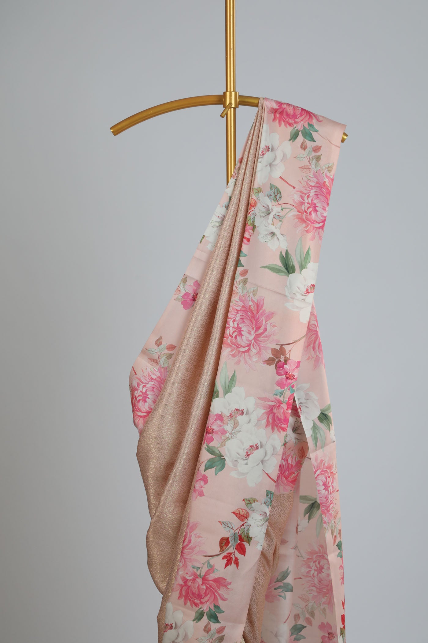 Kanchipuram brocade saree with printed border, pallu and blouse.