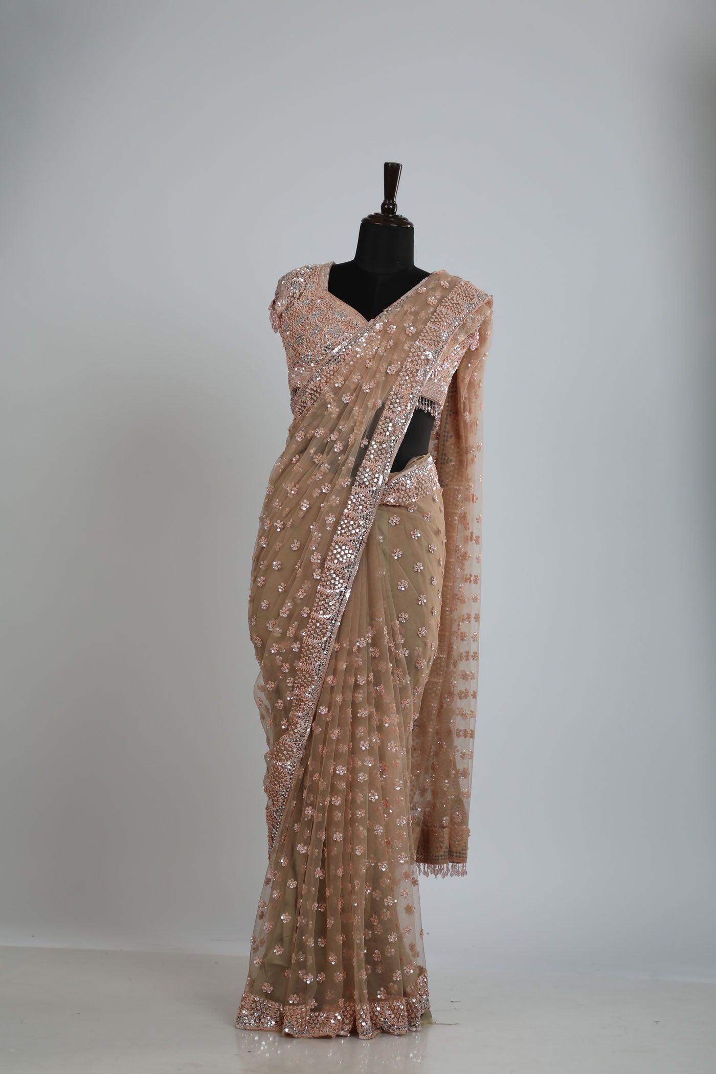 Embroidered net saree with ready made blouse