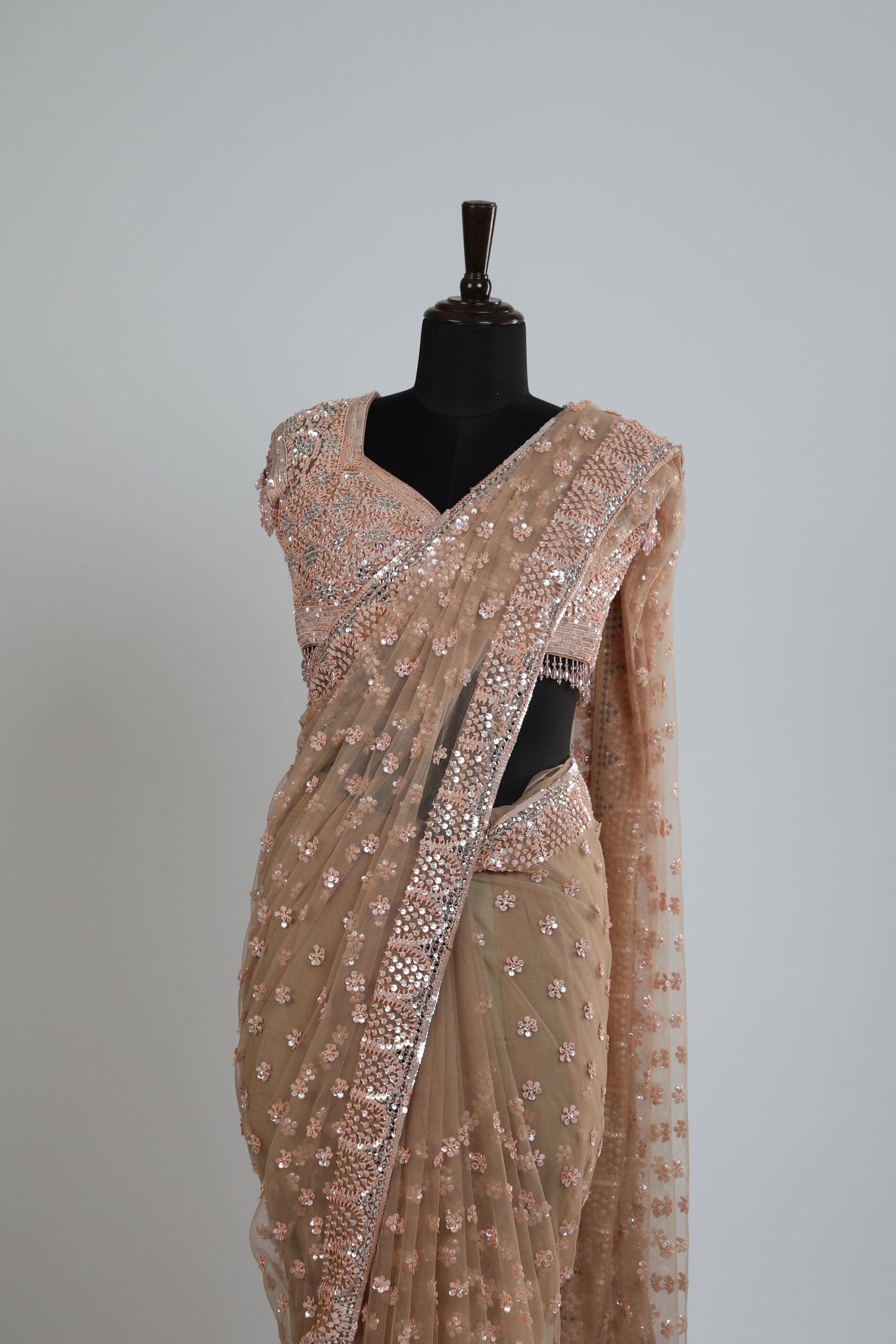 Embroidered net saree with ready made blouse