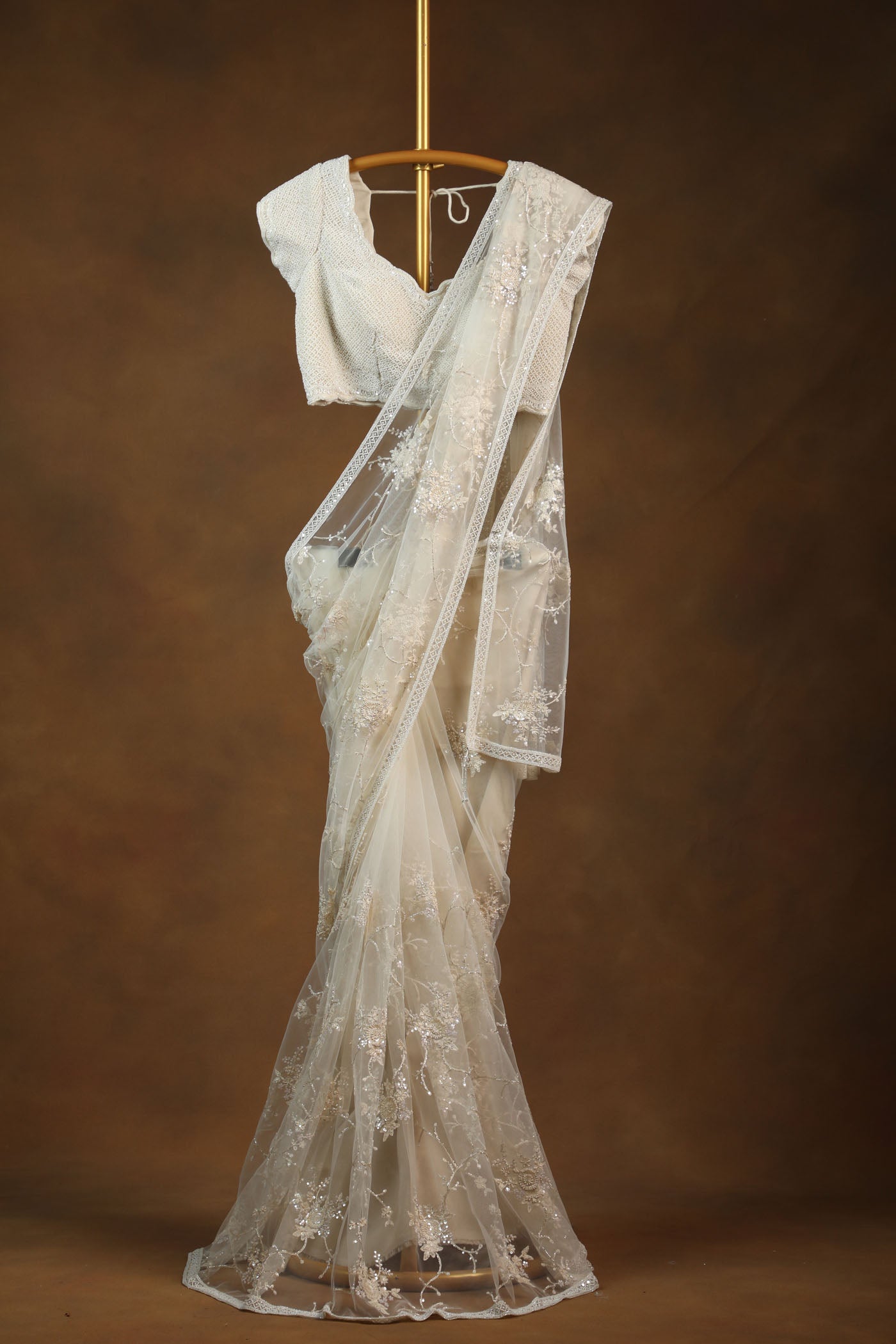 Ivory Embroidered Net Saree with Textured pearl Blouse (RTS)