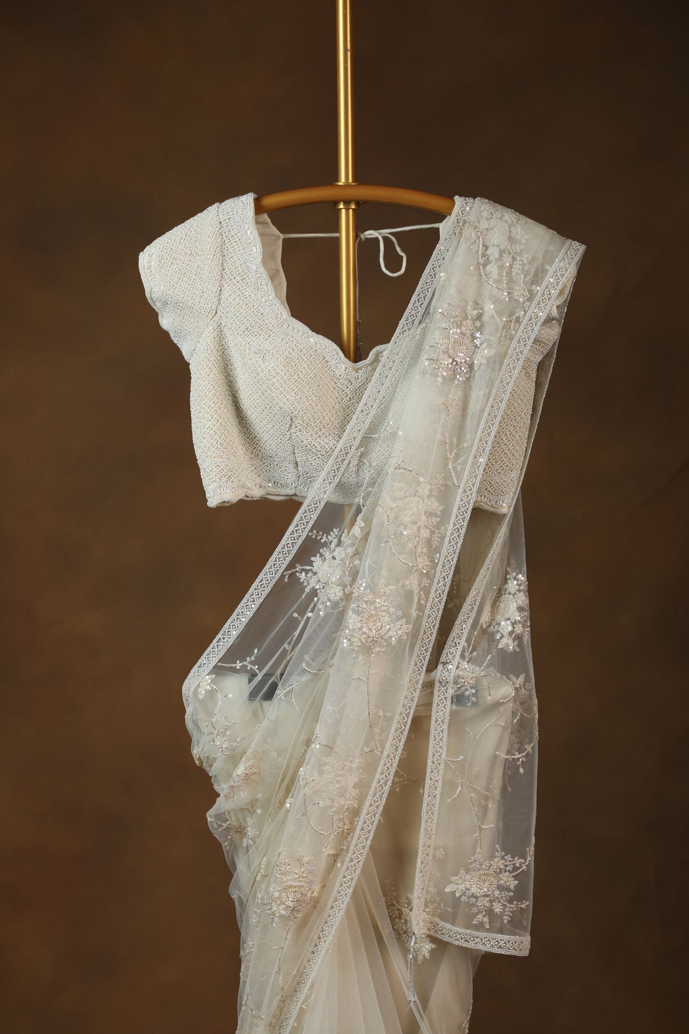 Ivory Embroidered Net Saree with Textured pearl Blouse (RTS)
