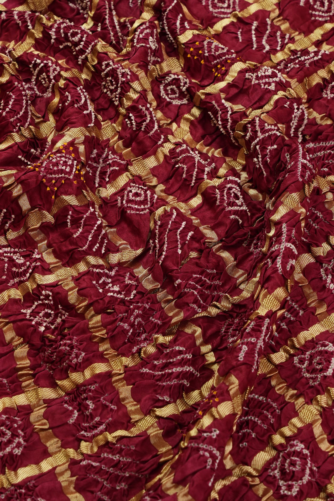 Traditional Maroon Bandhani Fabric with Zari Checks