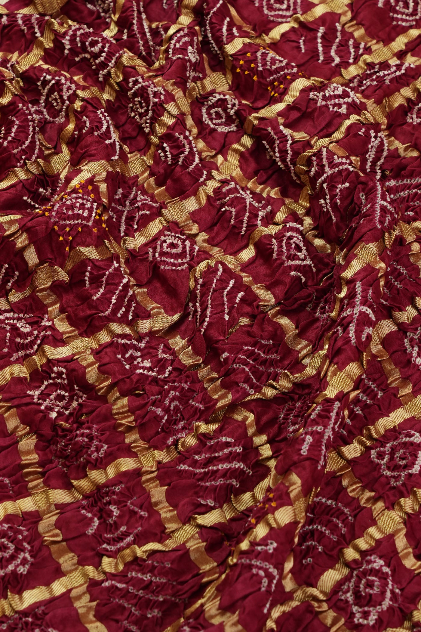 Traditional Maroon Bandhani Fabric with Zari Checks