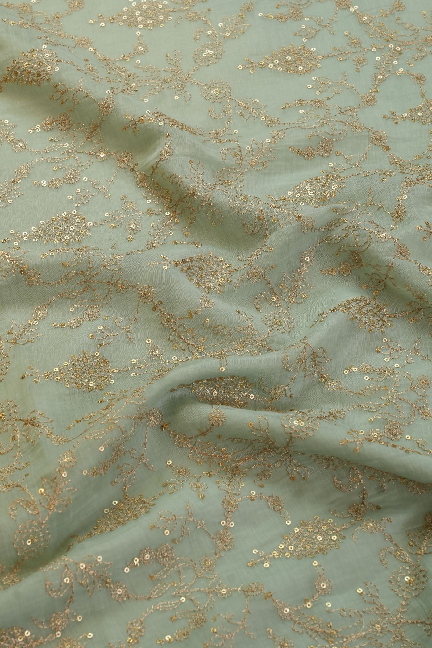 Elegant Seafoam Green Fabric with Gold Embroidery.