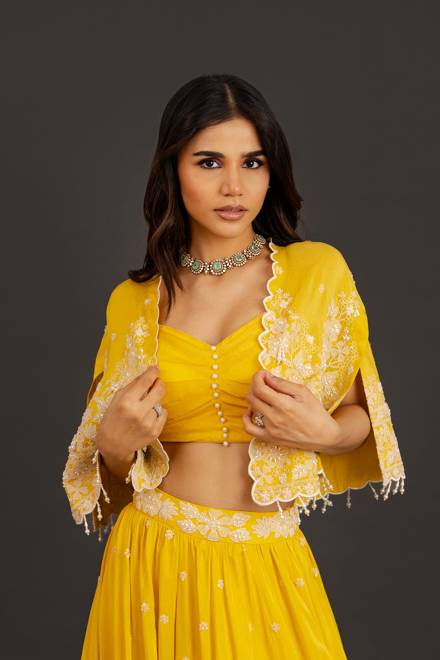 Vibrant yellow lehanga with cape