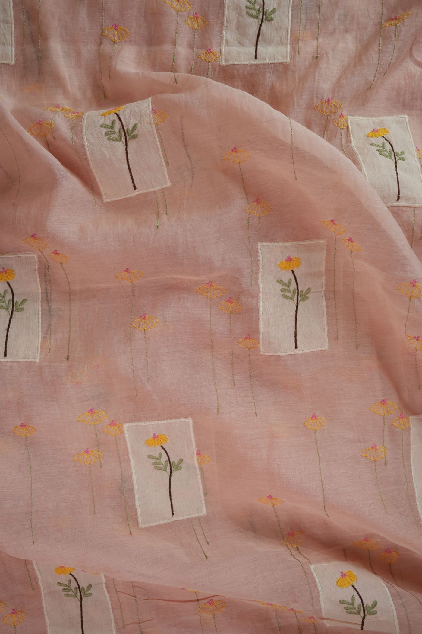 Soft Pastel Pink Fabric with Hand-Embroidered Floral Motifs