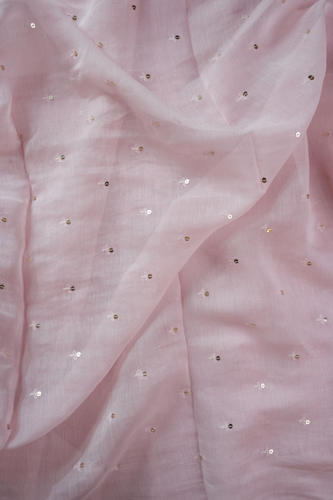 Pink Fabric with Subtle Sequin Embellishments