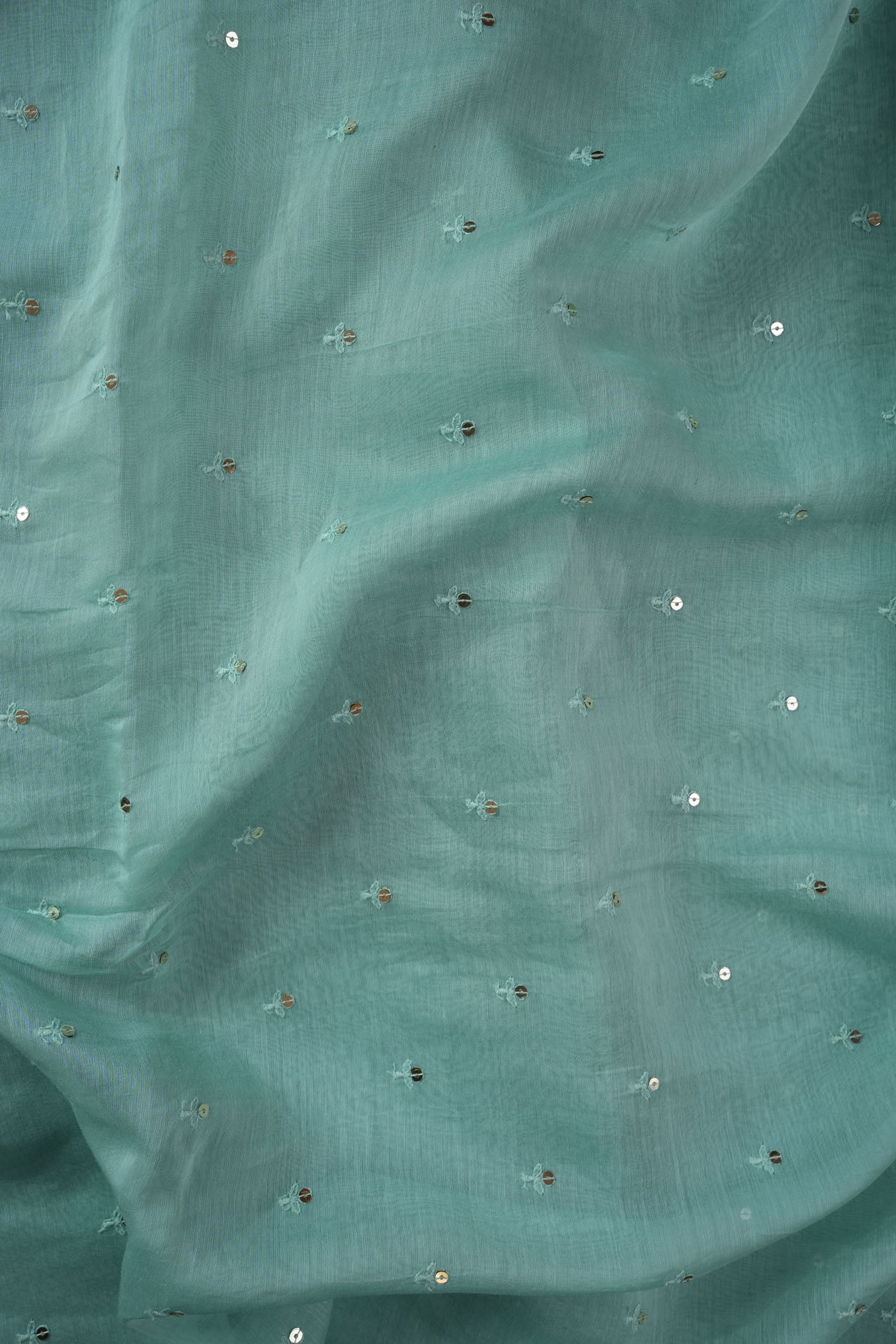Green Fabric with Subtle Sequin Embellishments