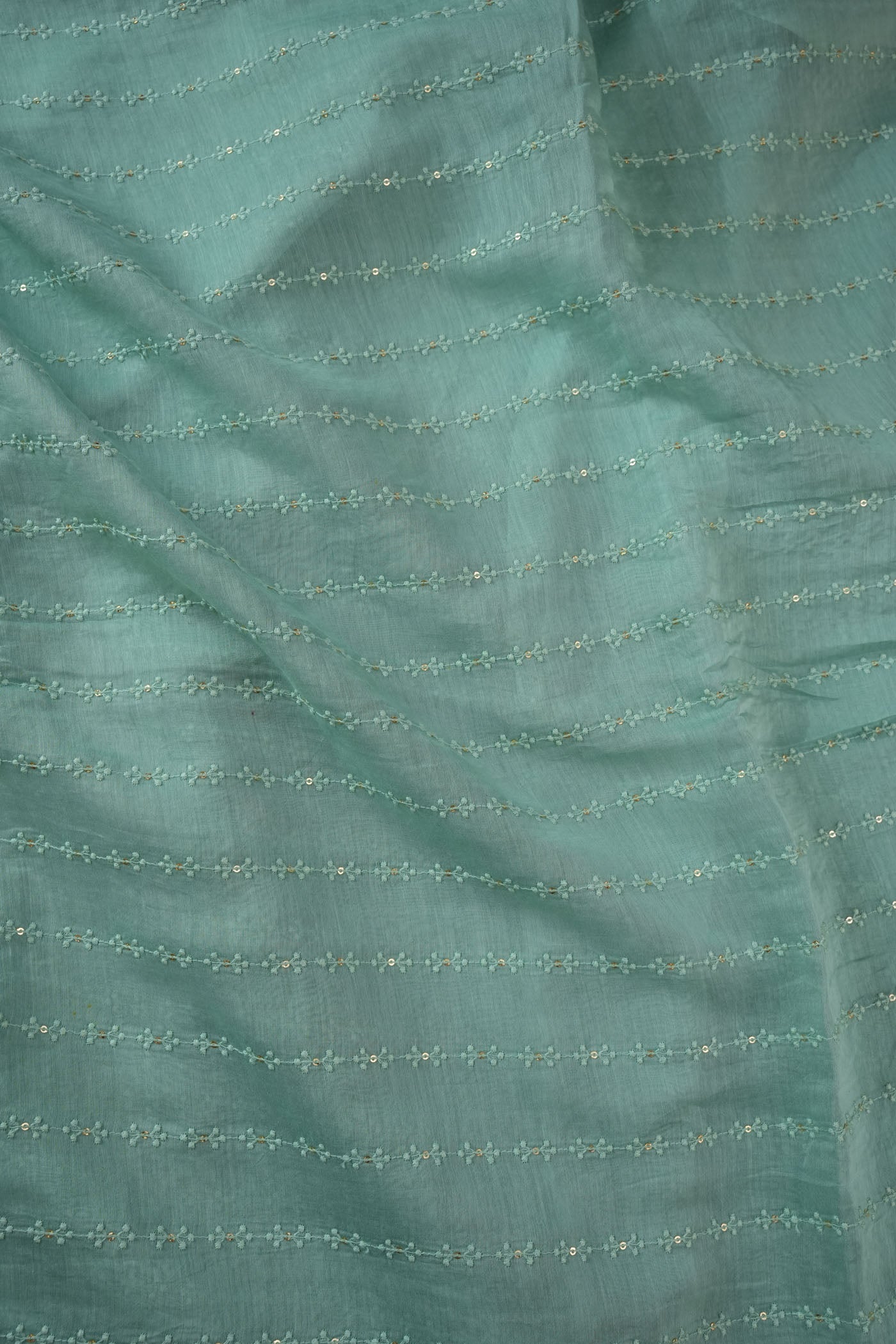 Green Fabric with Subtle Threaded Stripe Embroidery