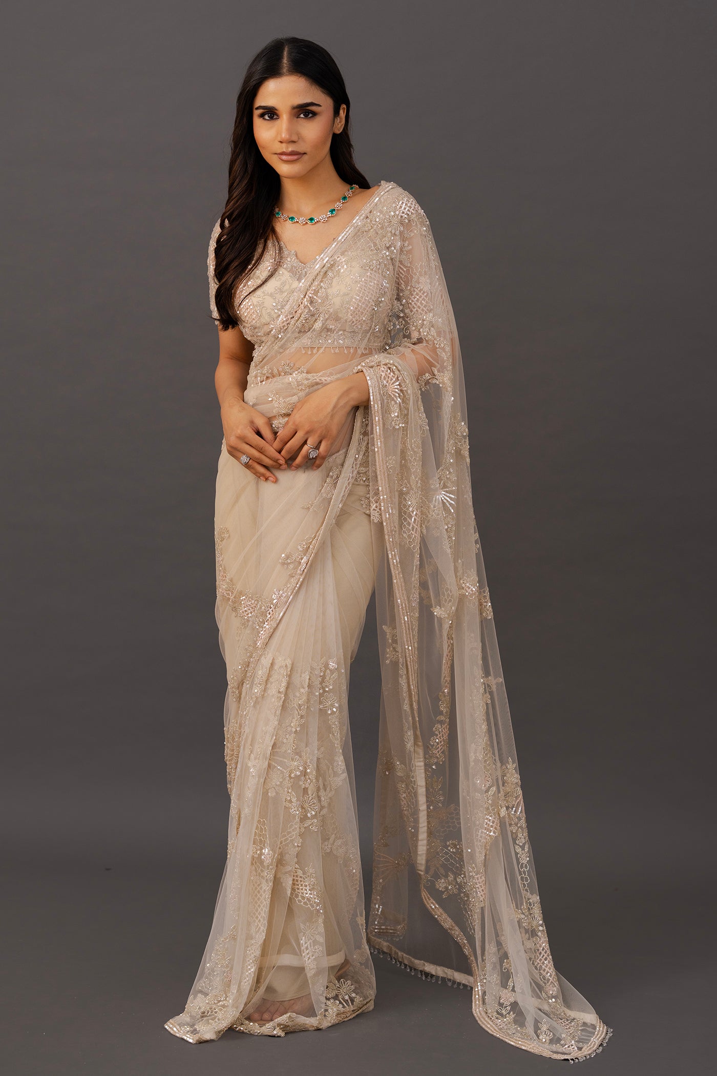 Ivory net saree with ready made blouse