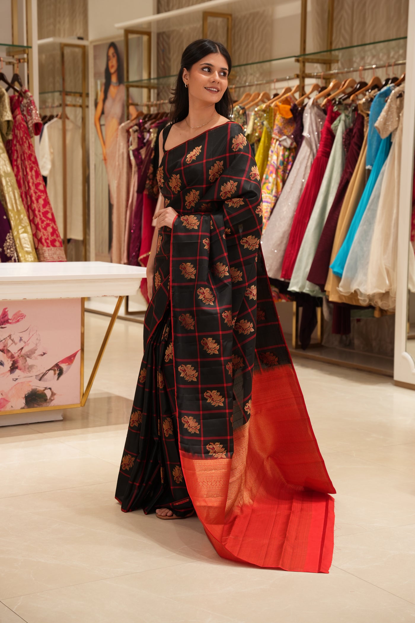Black & Red Checked Silk Saree that comes along with a contrast pallu